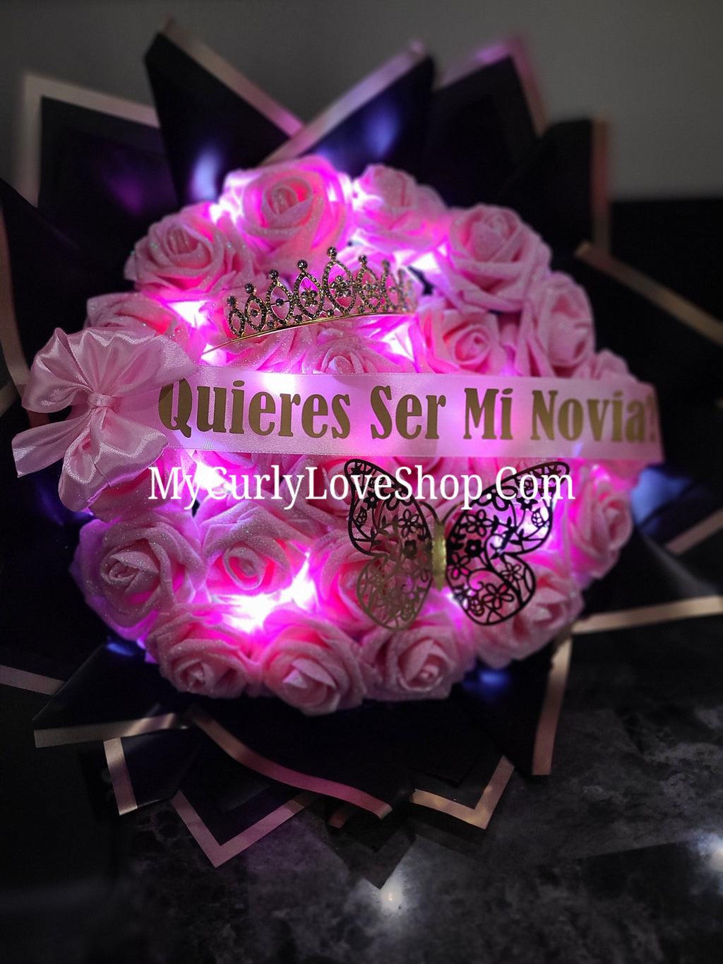 Glitter Roses Bouquet: Tiara and Butterfly Included (Tiara and Butterfly Shape Can Vary Depending on Availability) Banner and Lights are additional.