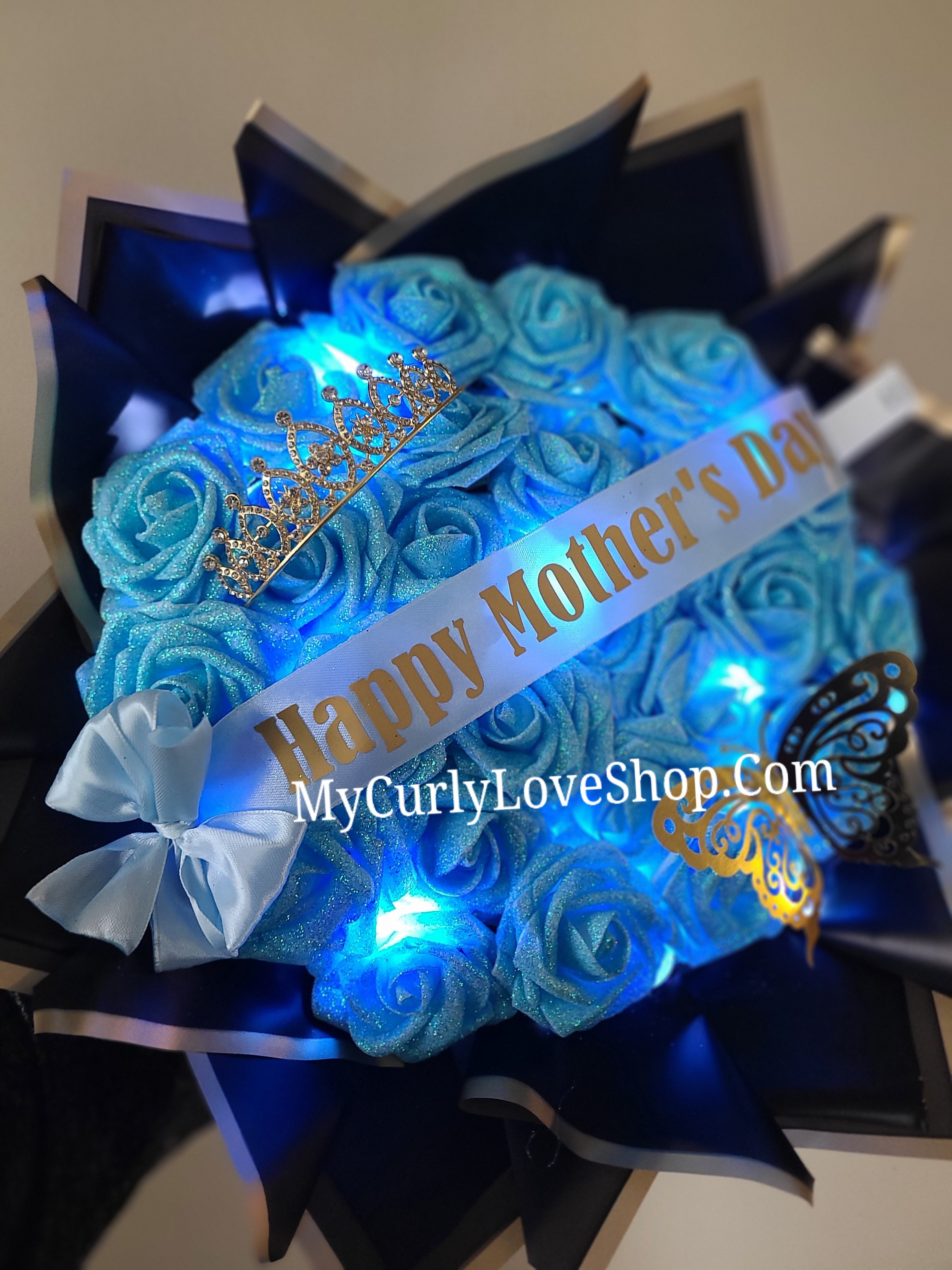 Glitter Roses Bouquet: Tiara and Butterfly Included (Tiara and Butterfly Shape Can Vary Depending on Availability) Banner and Lights are additional.