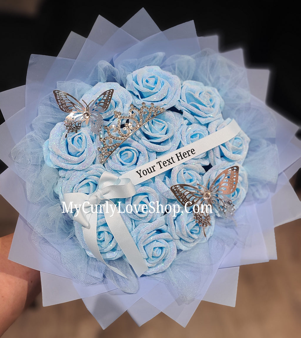 Blue Glitter Roses Bouquet: Silver Tiara and Butterfly Included (Tiara and Butterfly Shape Can Vary Depending on Availability) Banner and Lights are additional.