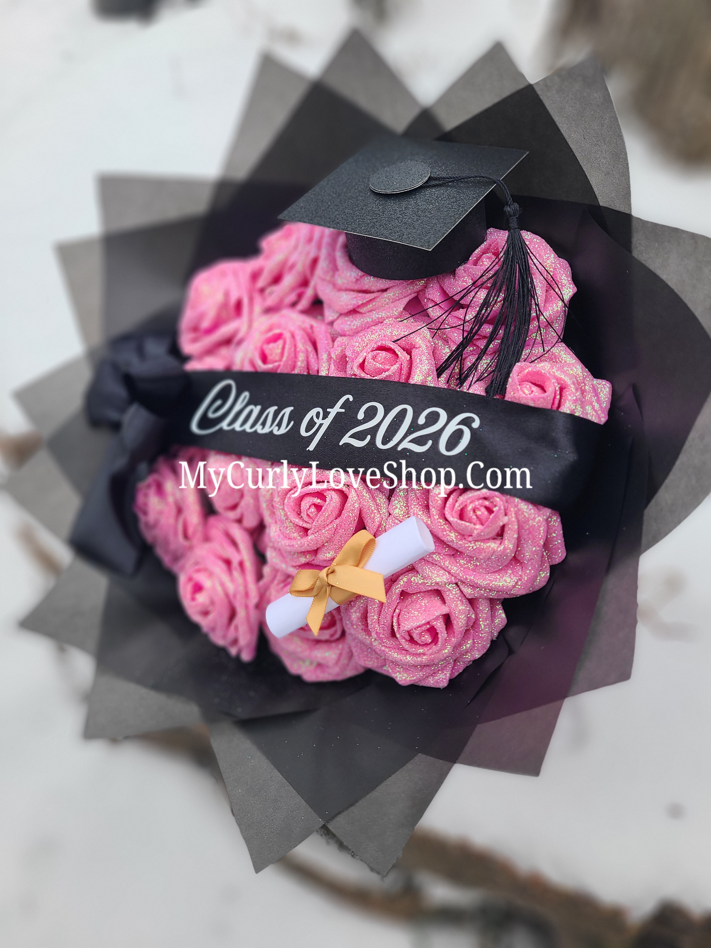 Graduation Glitter Roses Bouquet. Graduation Cap and Diploma Embellishment Included. Banner and Lights are additional.