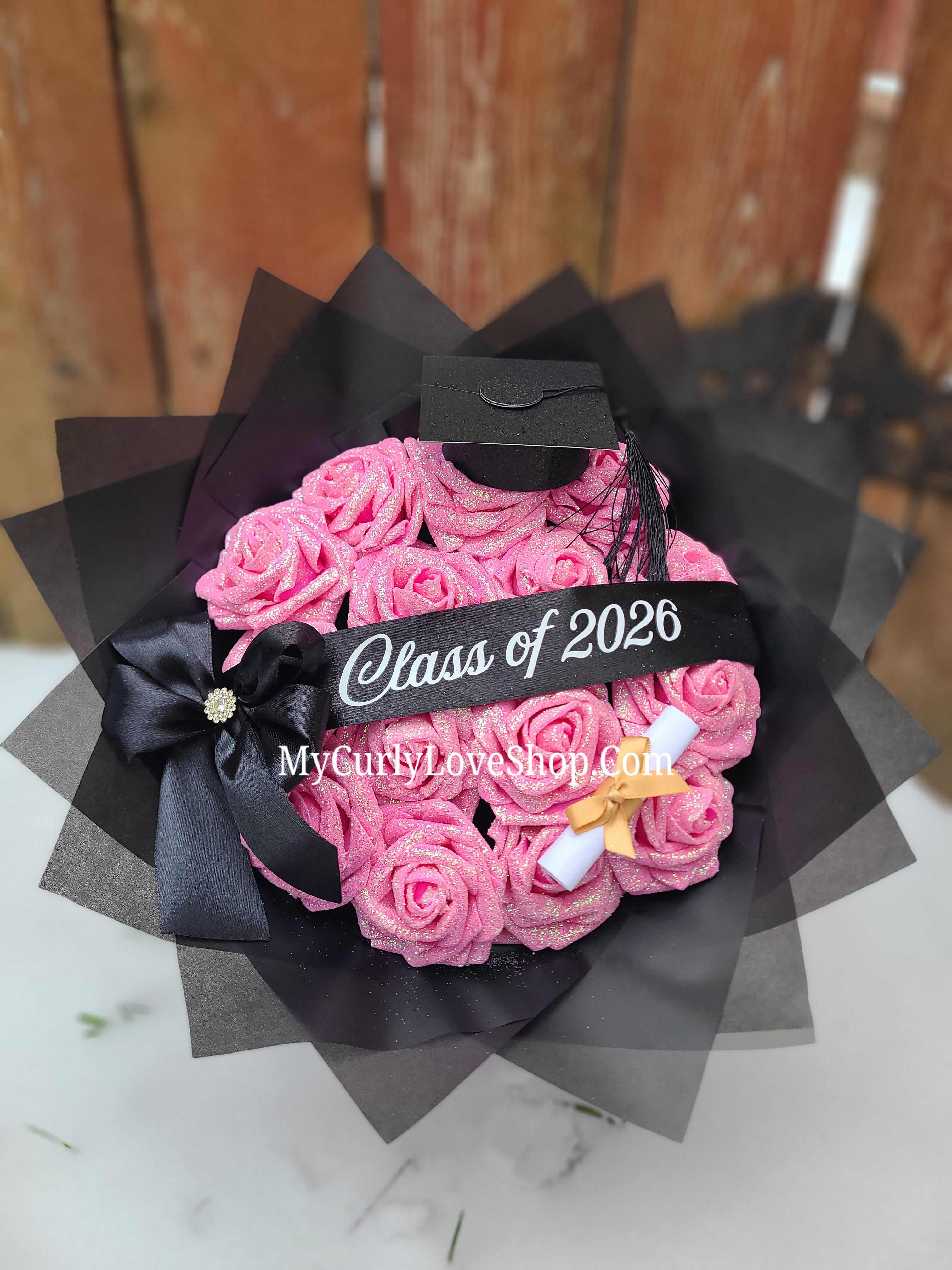 Graduation Glitter Roses Bouquet. Graduation Cap and Diploma Embellishment Included. Banner and Lights are additional.