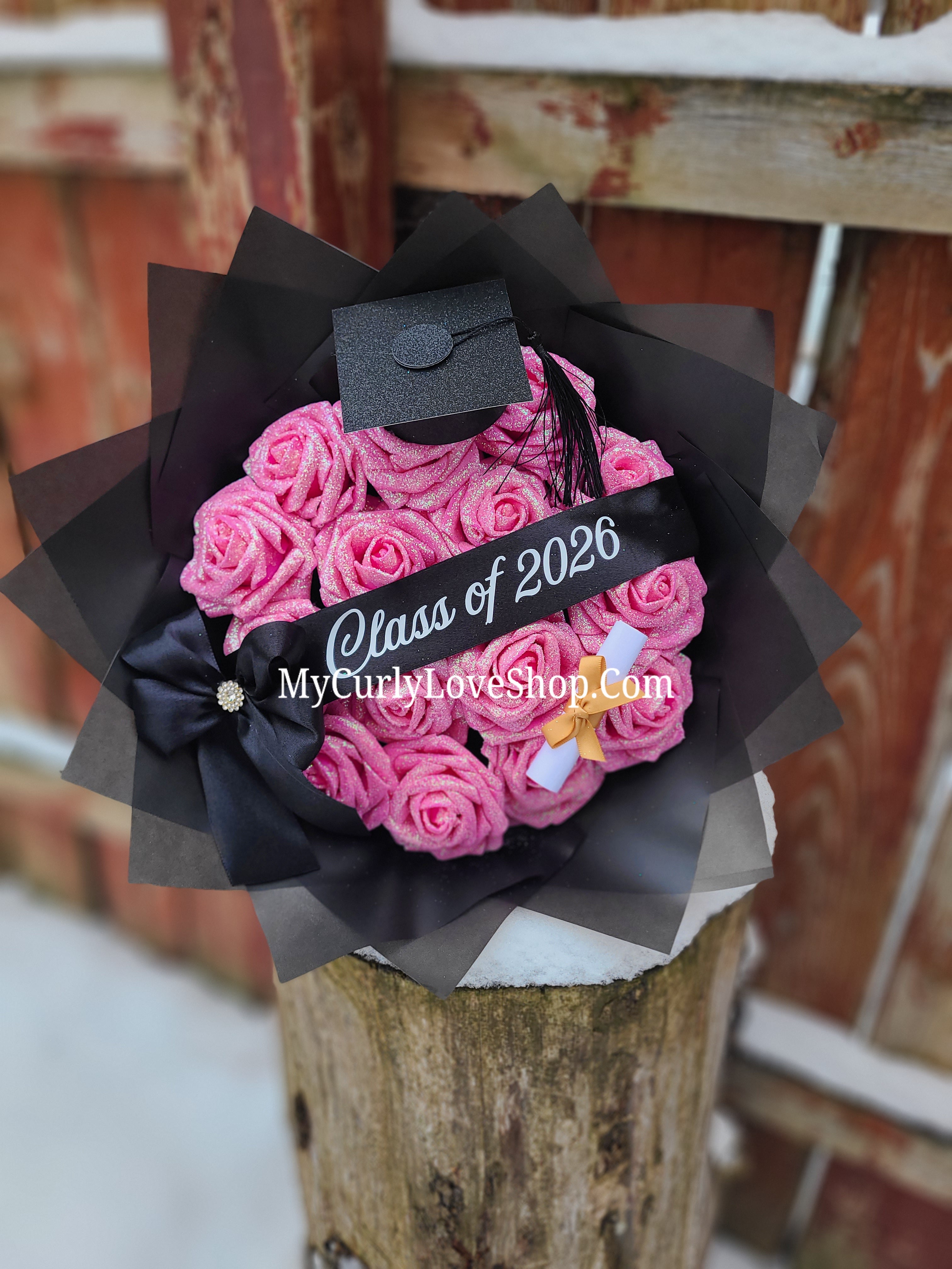 Graduation Glitter Roses Bouquet. Graduation Cap and Diploma Embellishment Included. Banner and Lights are additional.