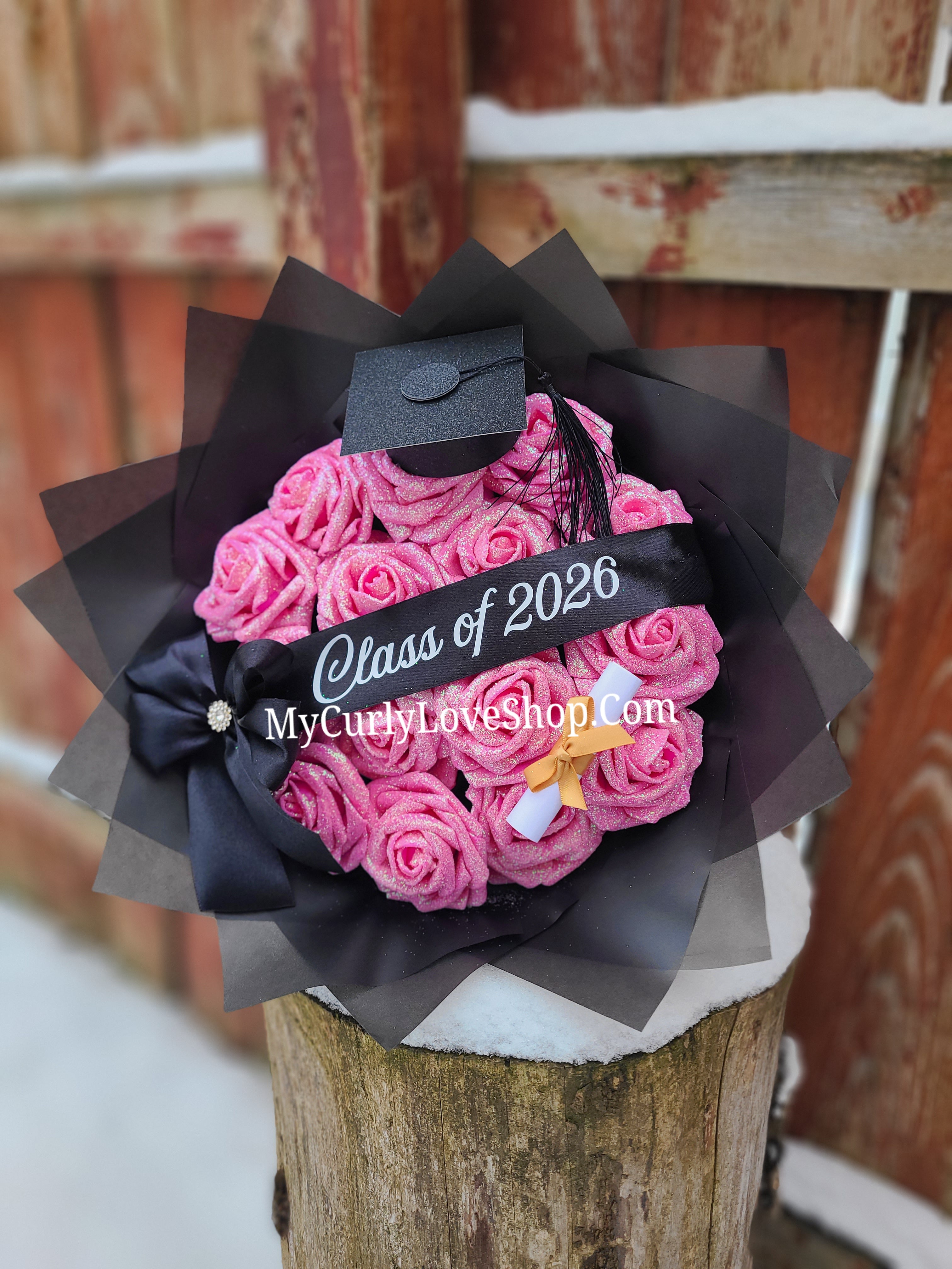 Graduation Glitter Roses Bouquet. Graduation Cap and Diploma Embellishment Included. Banner and Lights are additional.
