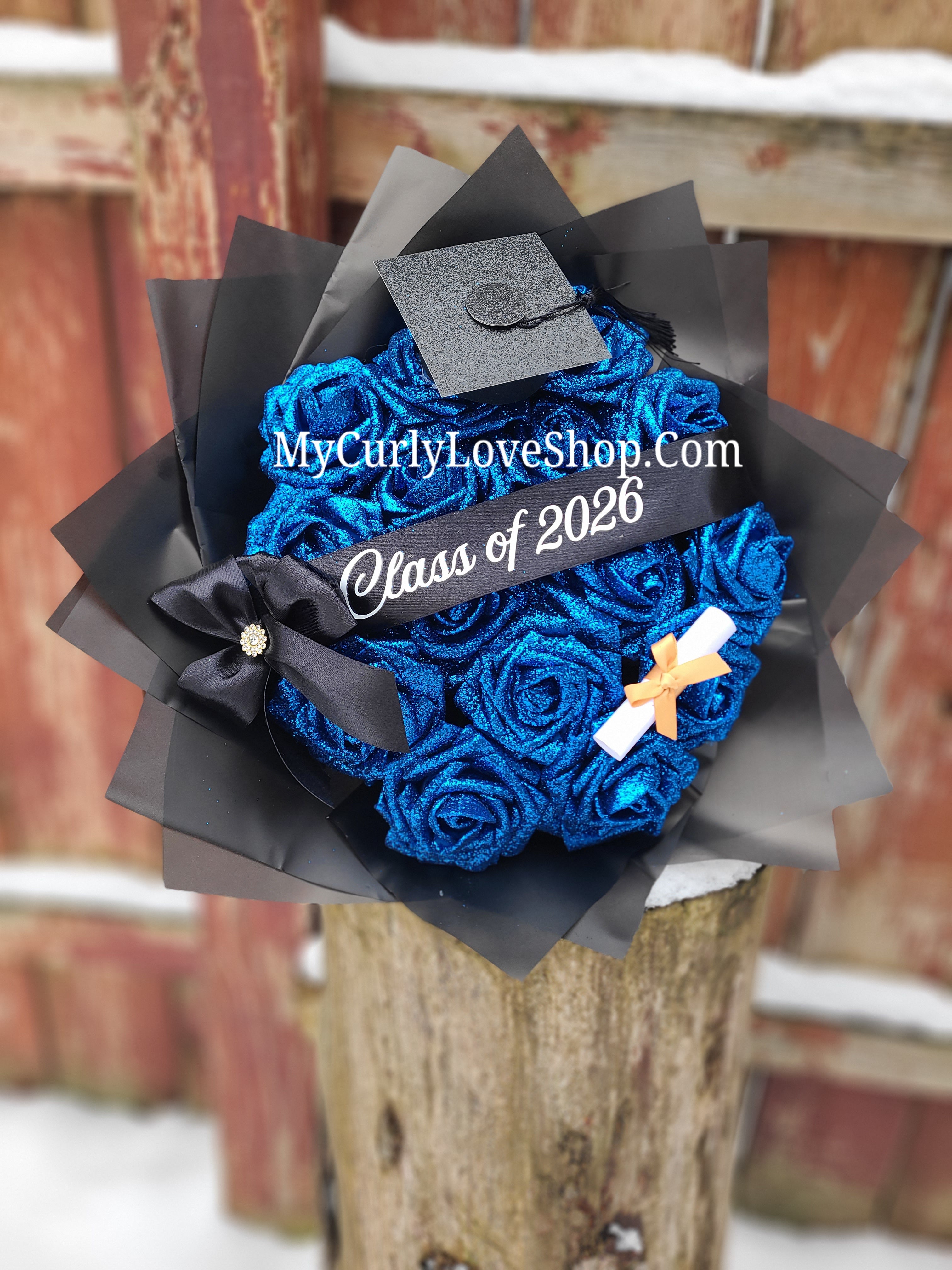 Graduation Glitter Roses Bouquet. Graduation Cap and Diploma Embellishment Included. Banner and Lights are additional.