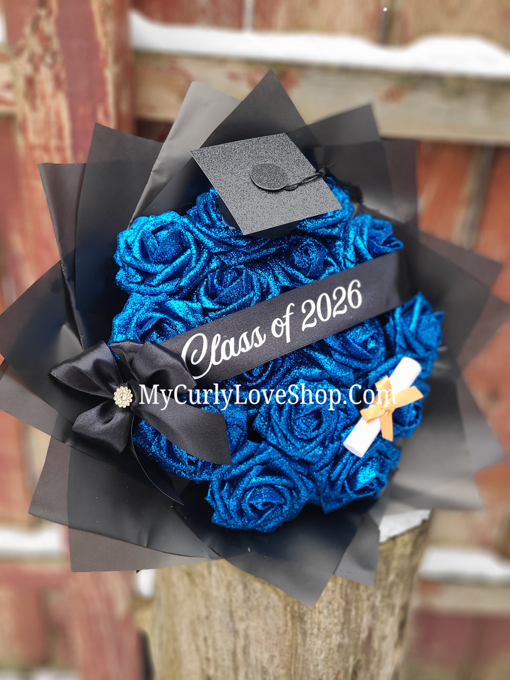Graduation Glitter Roses Bouquet. Graduation Cap and Diploma Embellishment Included. Banner and Lights are additional.