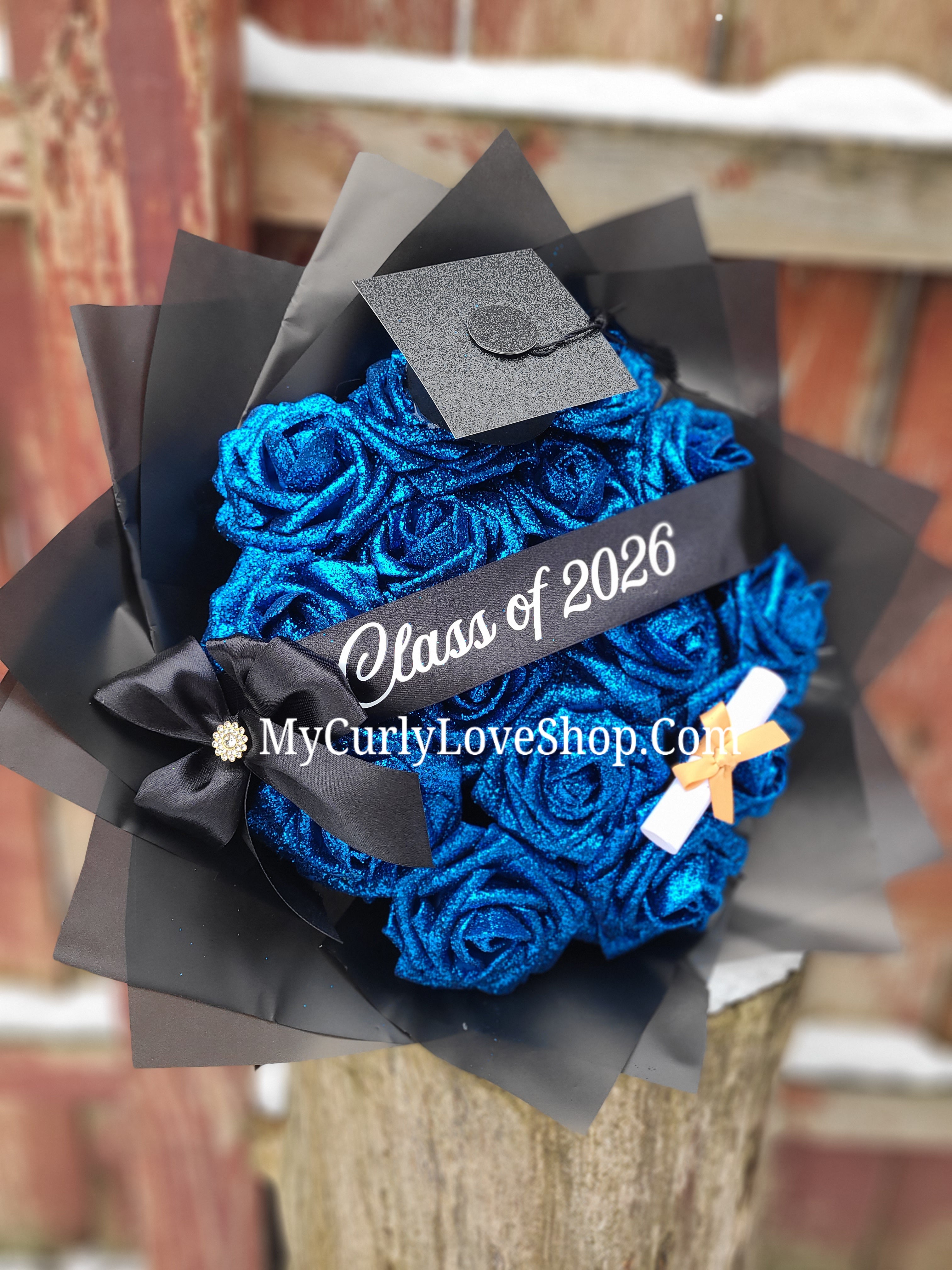 Graduation Glitter Roses Bouquet. Graduation Cap and Diploma Embellishment Included. Banner and Lights are additional.