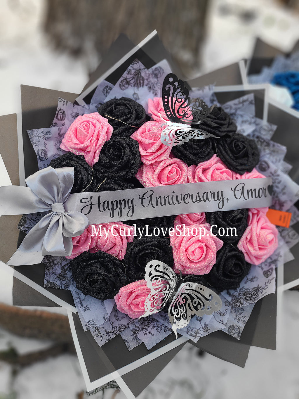 Floral Glitter Roses Bouquet. Comes with two silver butterflies. Banner and Lights are additional. See selection.