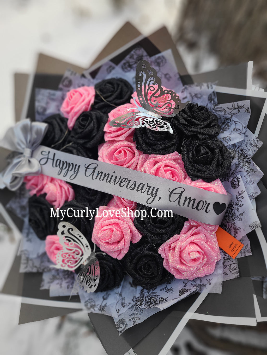 Floral Glitter Roses Bouquet. Comes with two silver butterflies. Banner and Lights are additional. See selection.