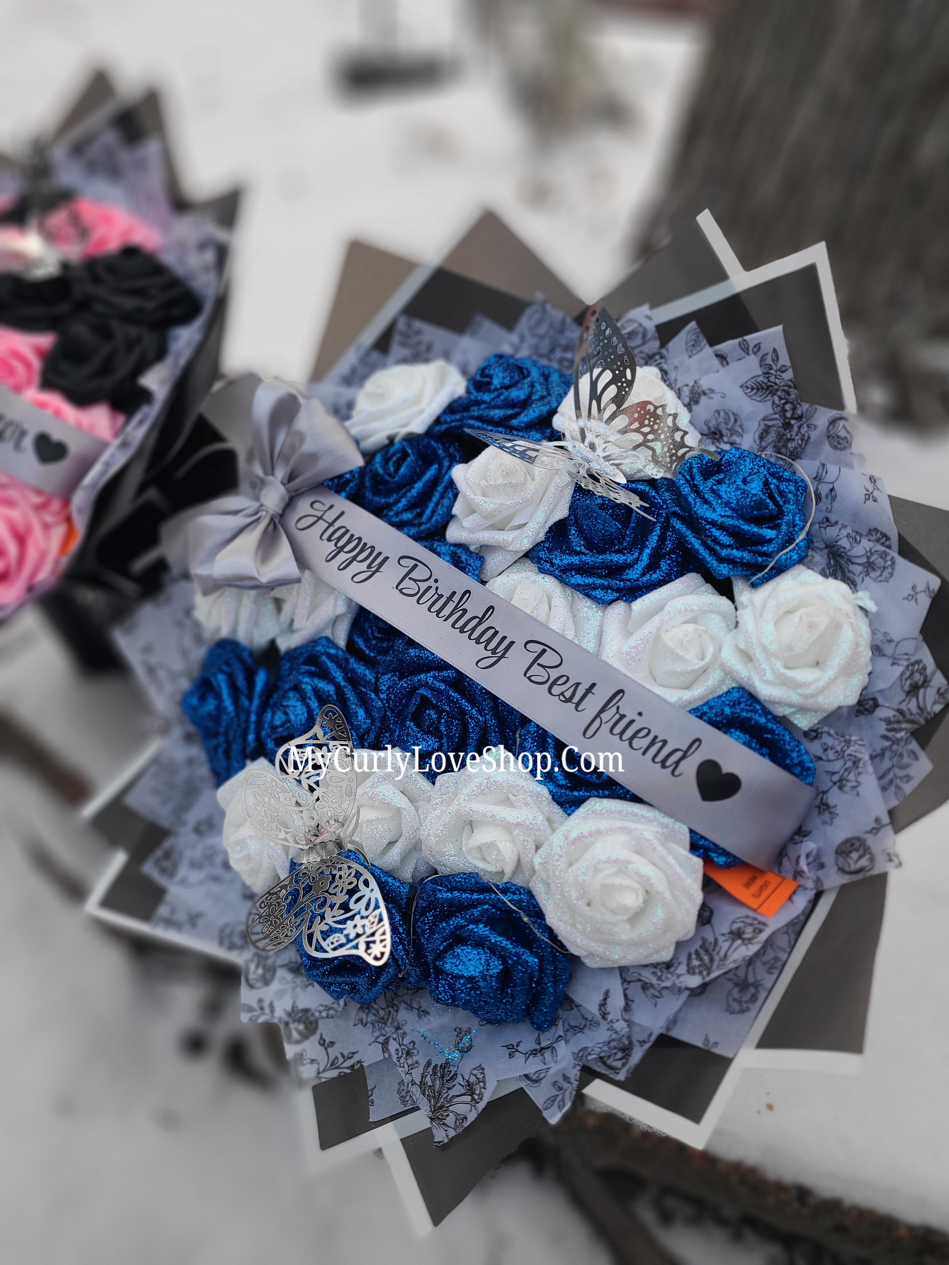 Floral Glitter Roses Bouquet. Comes with two silver butterflies. Banner and Lights are additional. See selection.