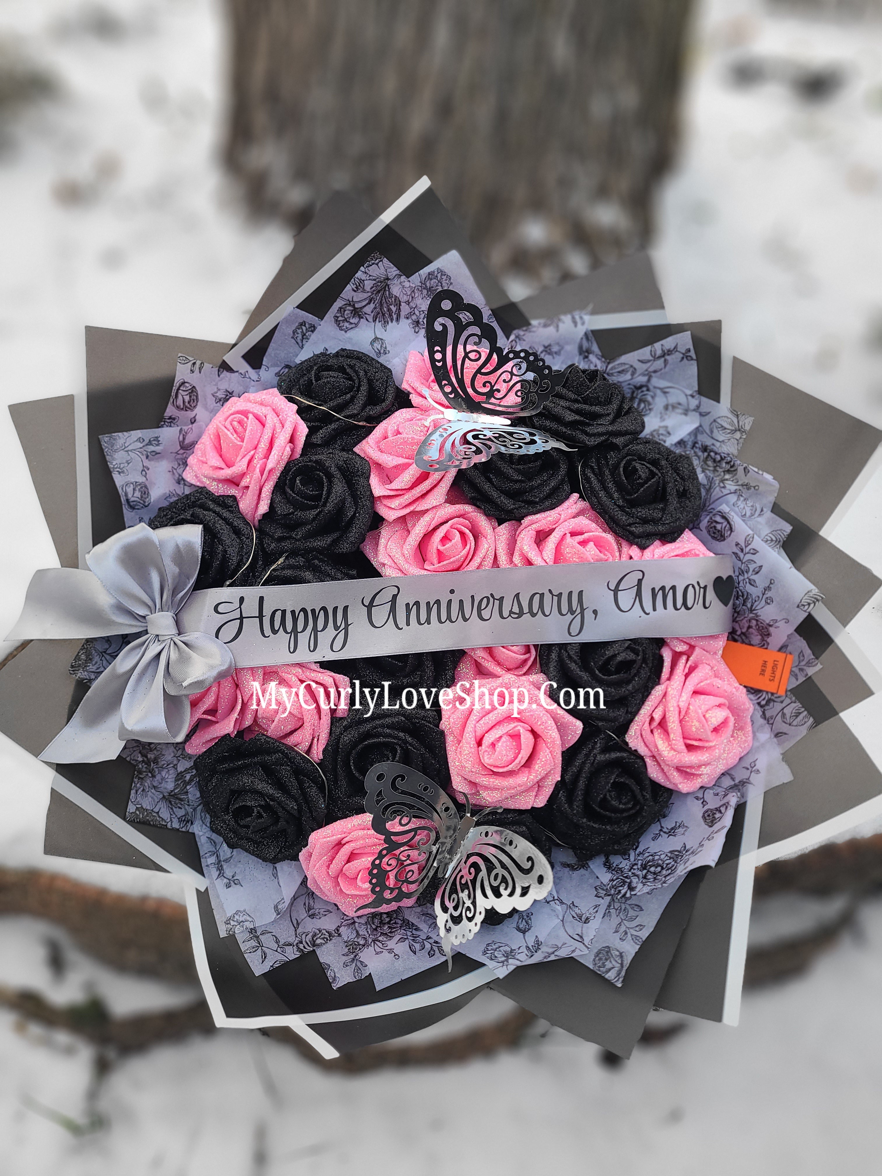 Floral Glitter Roses Bouquet. Comes with two silver butterflies. Banner and Lights are additional. See selection.