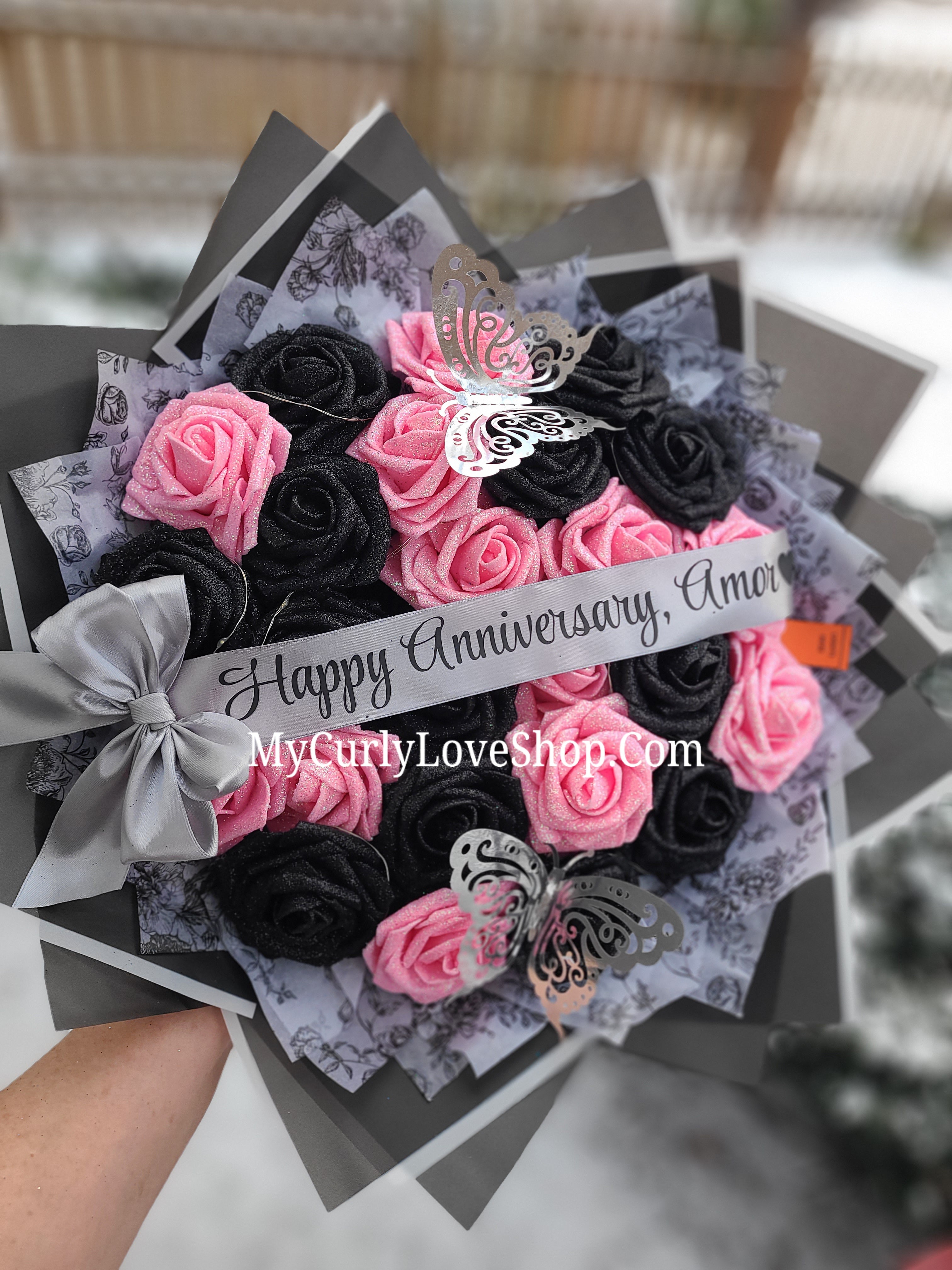 Floral Glitter Roses Bouquet. Comes with two silver butterflies. Banner and Lights are additional. See selection.