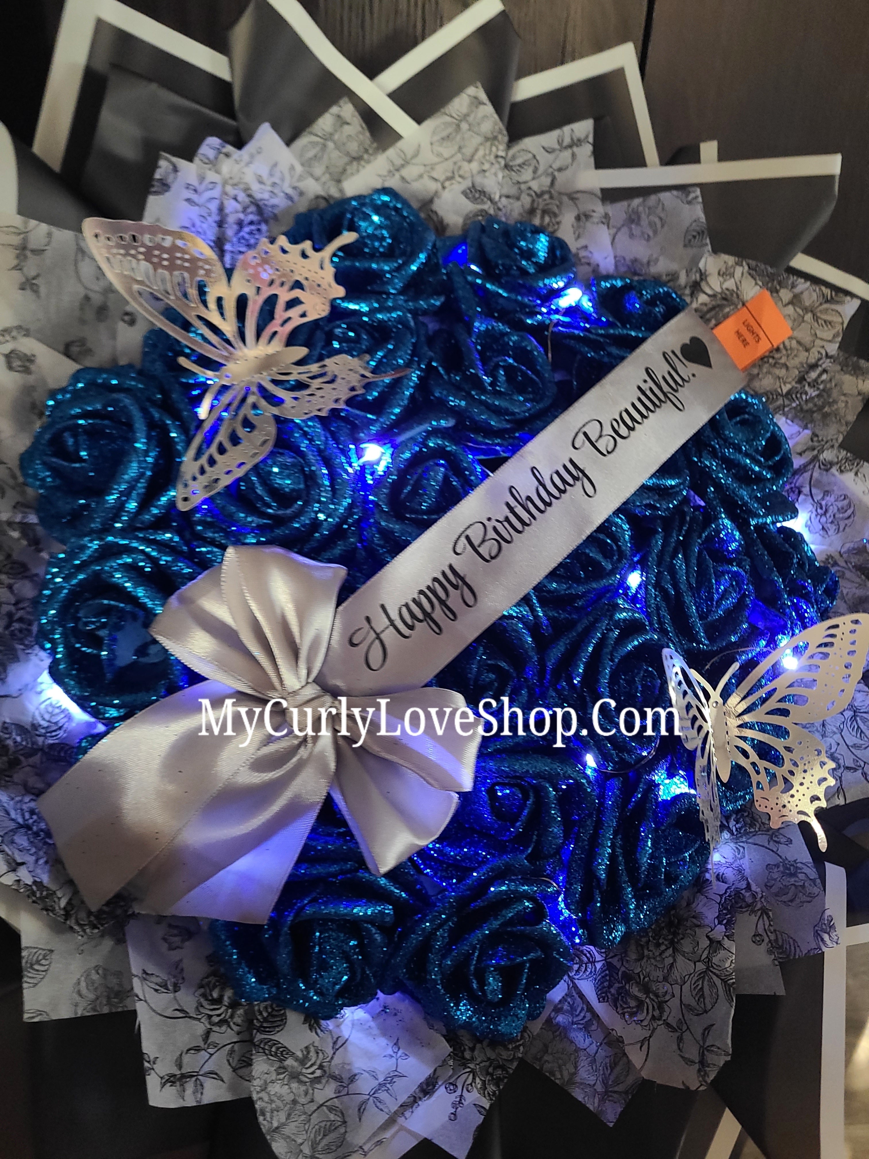 Floral Glitter Roses Bouquet. Comes with two silver butterflies. Banner and Lights are additional. See selection.