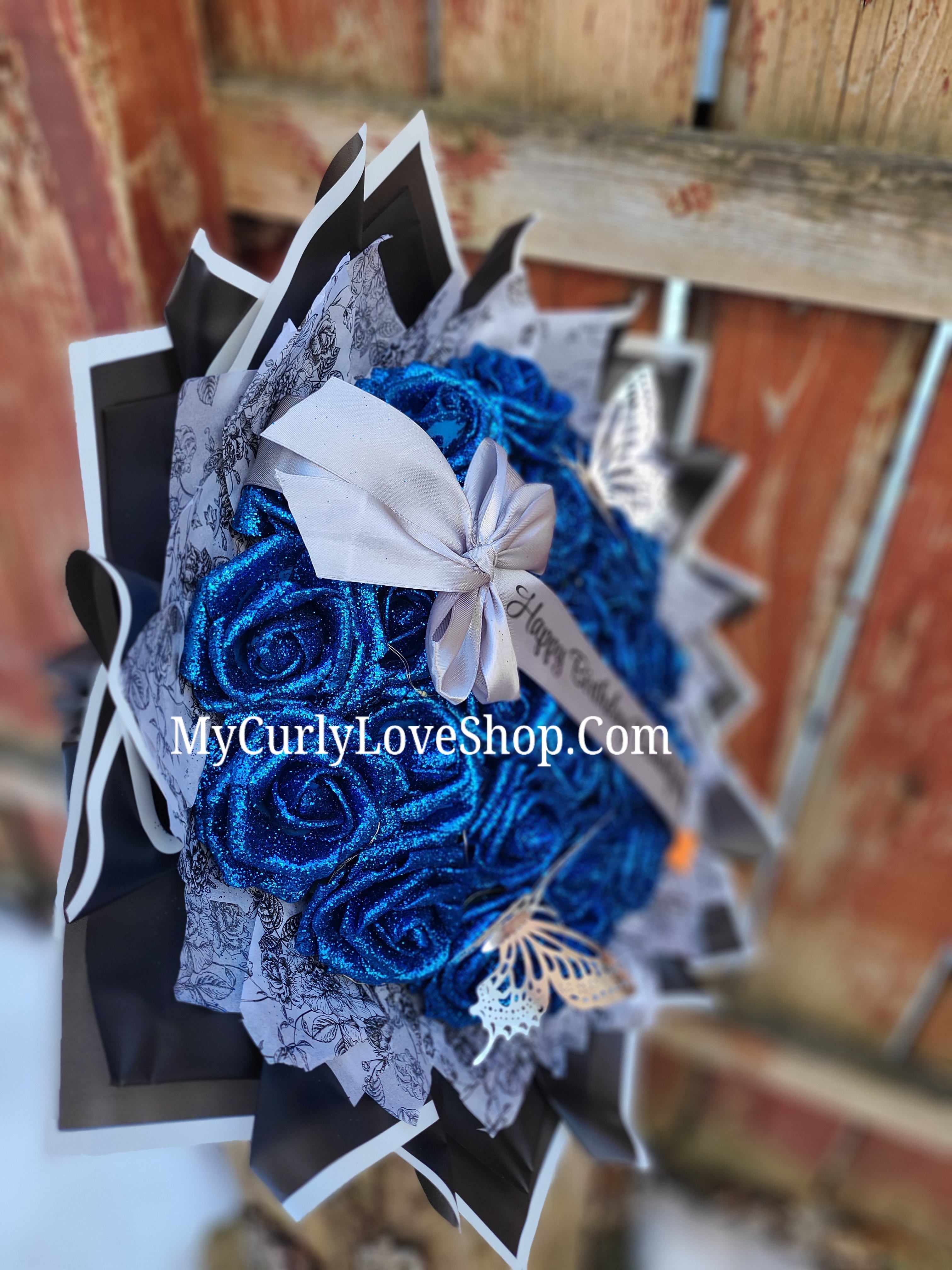 Floral Glitter Roses Bouquet. Comes with two silver butterflies. Banner and Lights are additional. See selection.