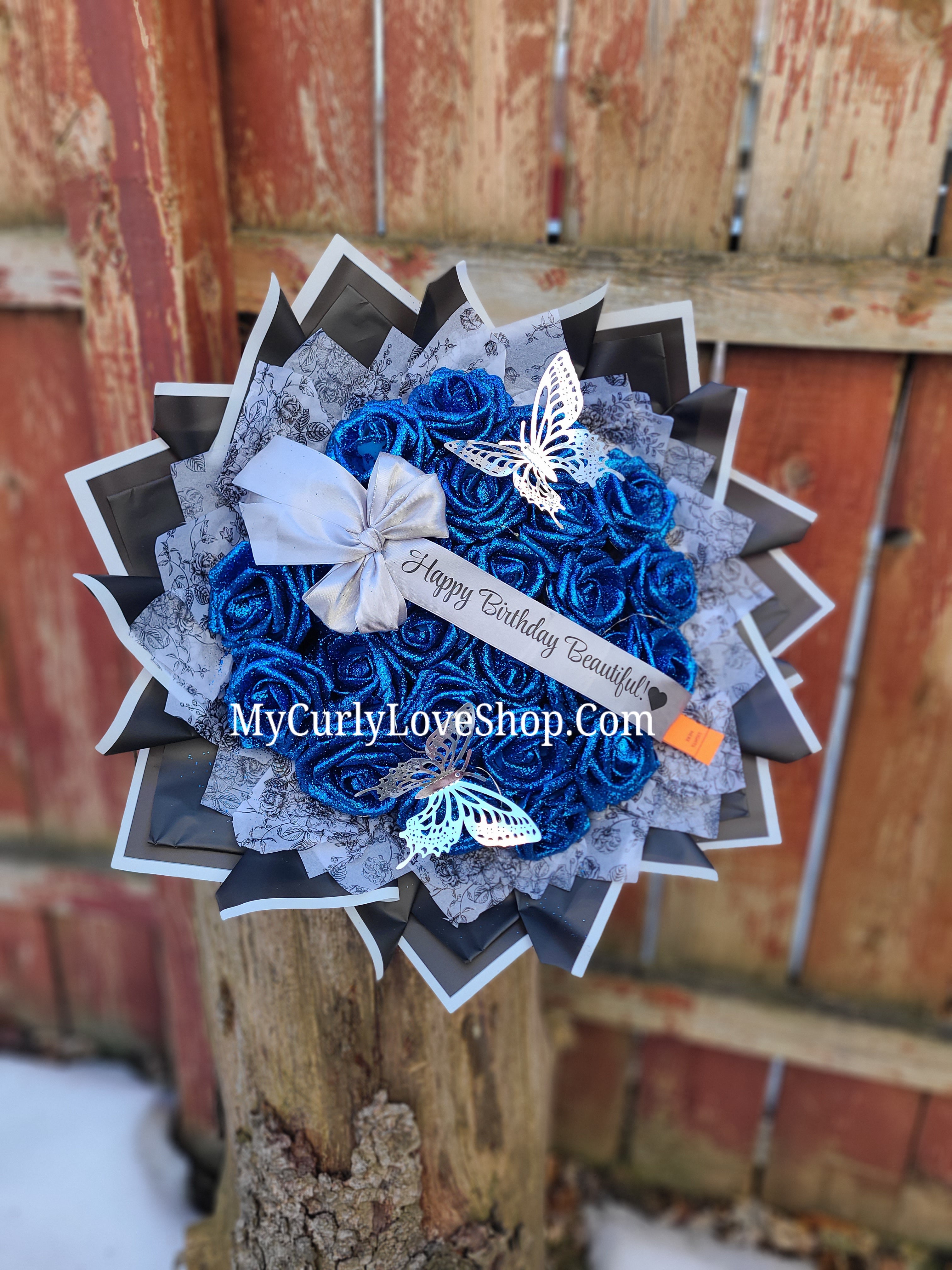Floral Glitter Roses Bouquet. Comes with two silver butterflies. Banner and Lights are additional. See selection.