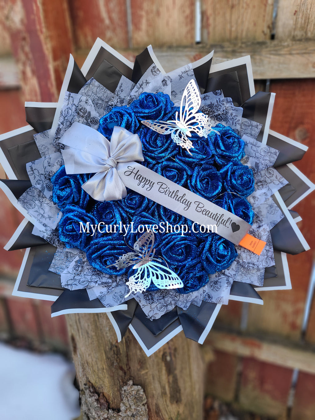 Floral Glitter Roses Bouquet. Comes with two silver butterflies. Banner and Lights are additional. See selection.