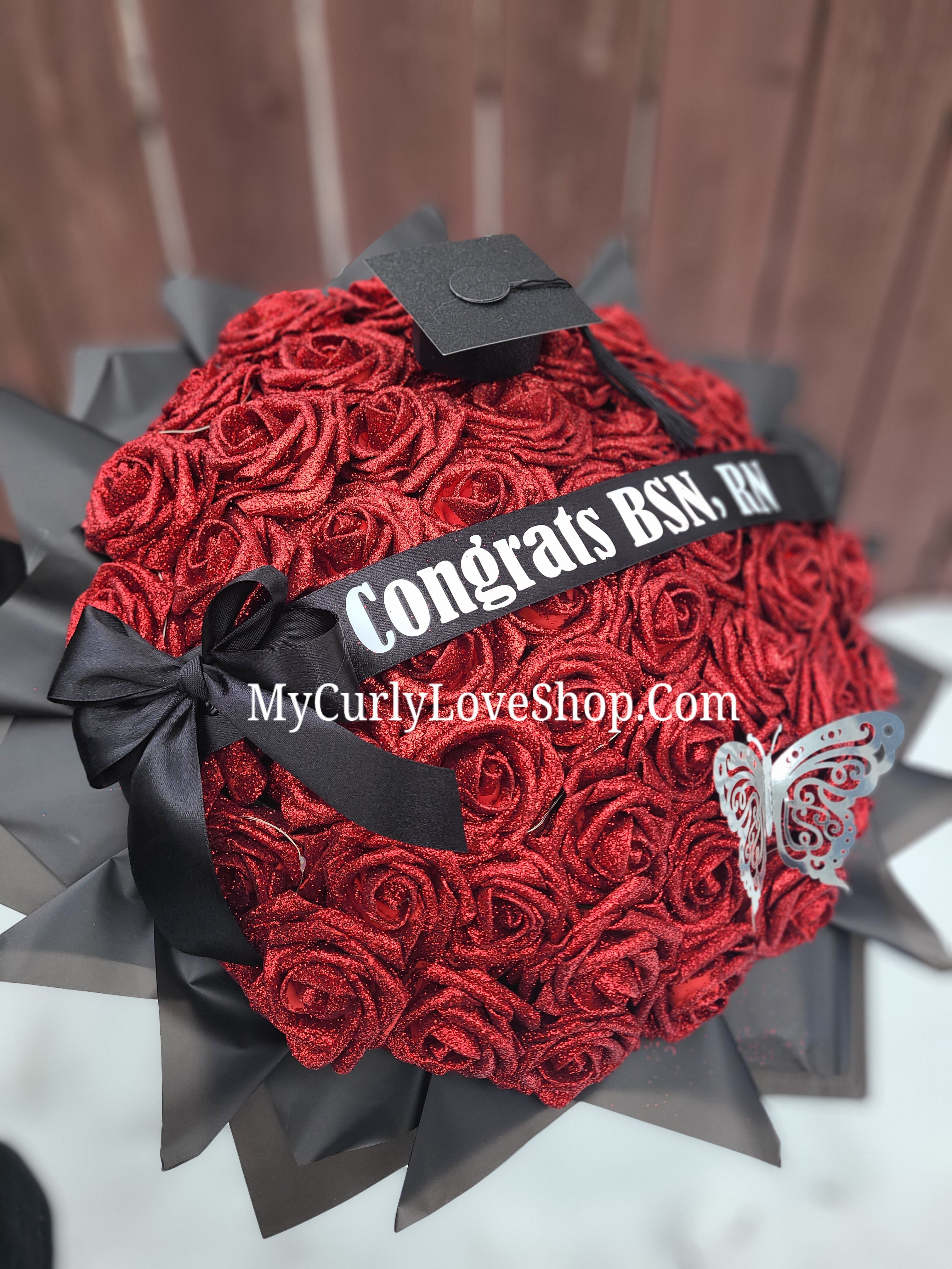 Ramo Comes with Graduation Cap or Tiara. Glitter Roses.  Banner and Lights are additional, see selection.
