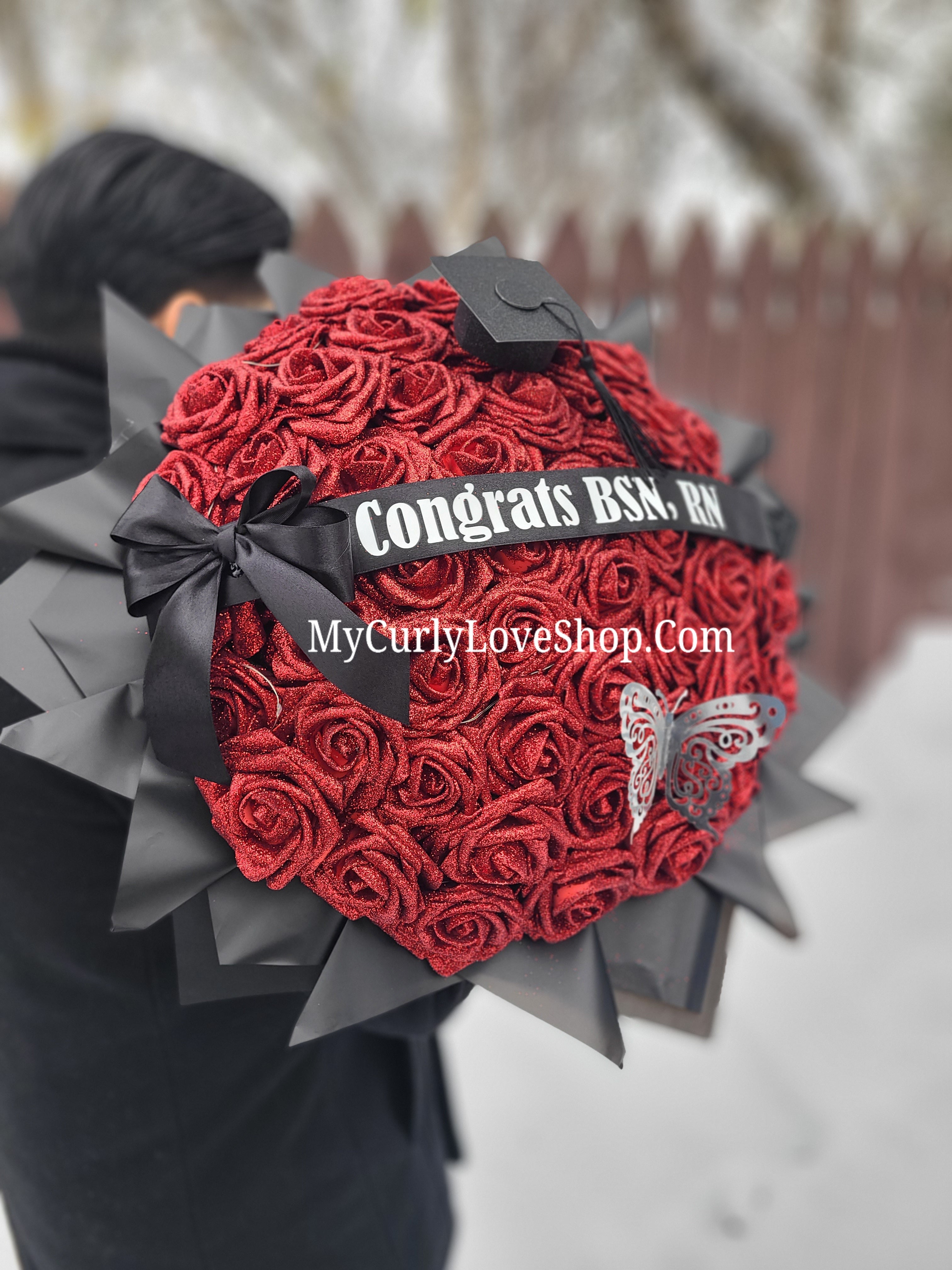 Ramo Comes with Graduation Cap or Tiara. Glitter Roses.  Banner and Lights are additional, see selection.