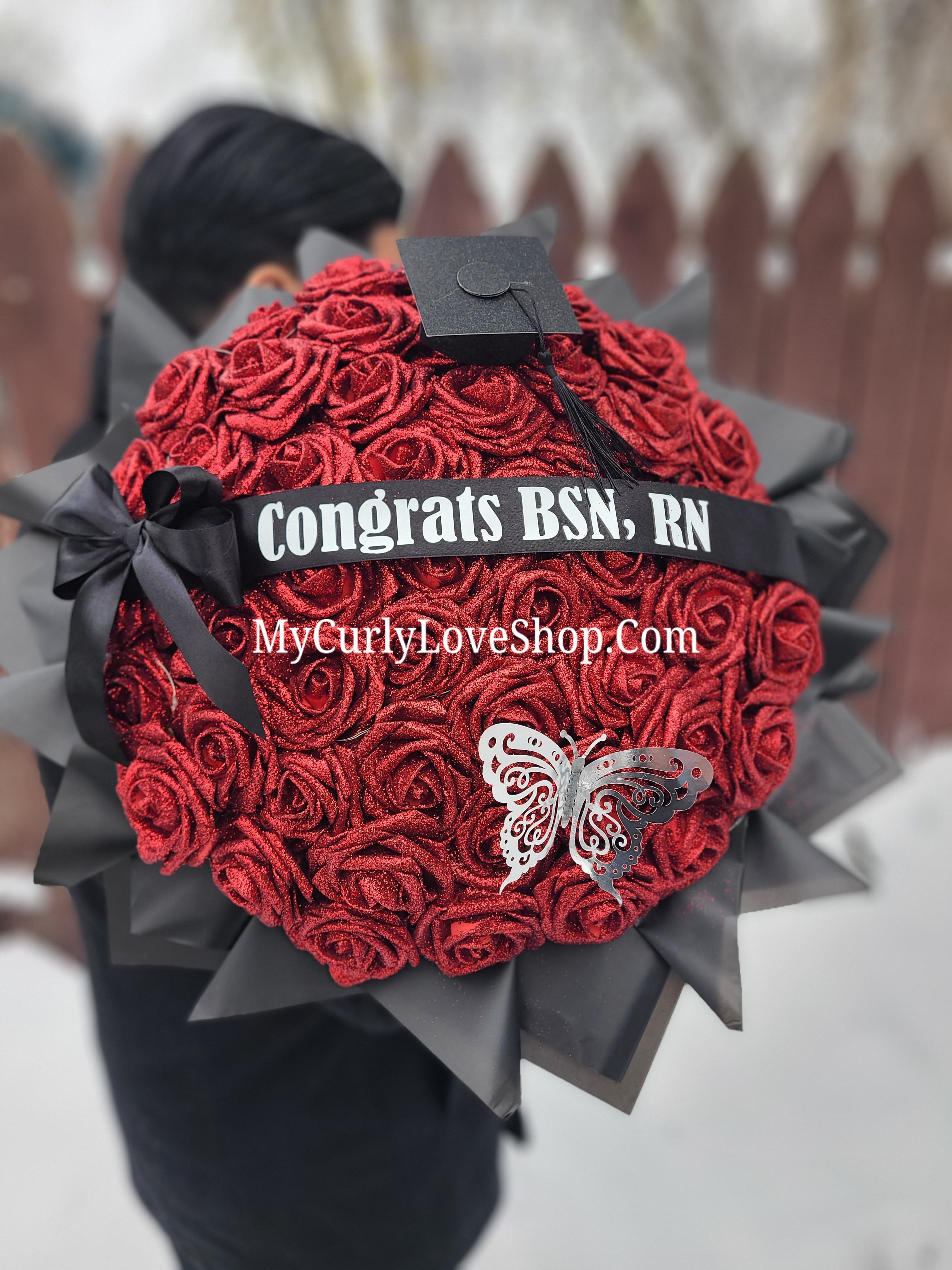 Ramo Comes with Graduation Cap or Tiara. Glitter Roses.  Banner and Lights are additional, see selection.