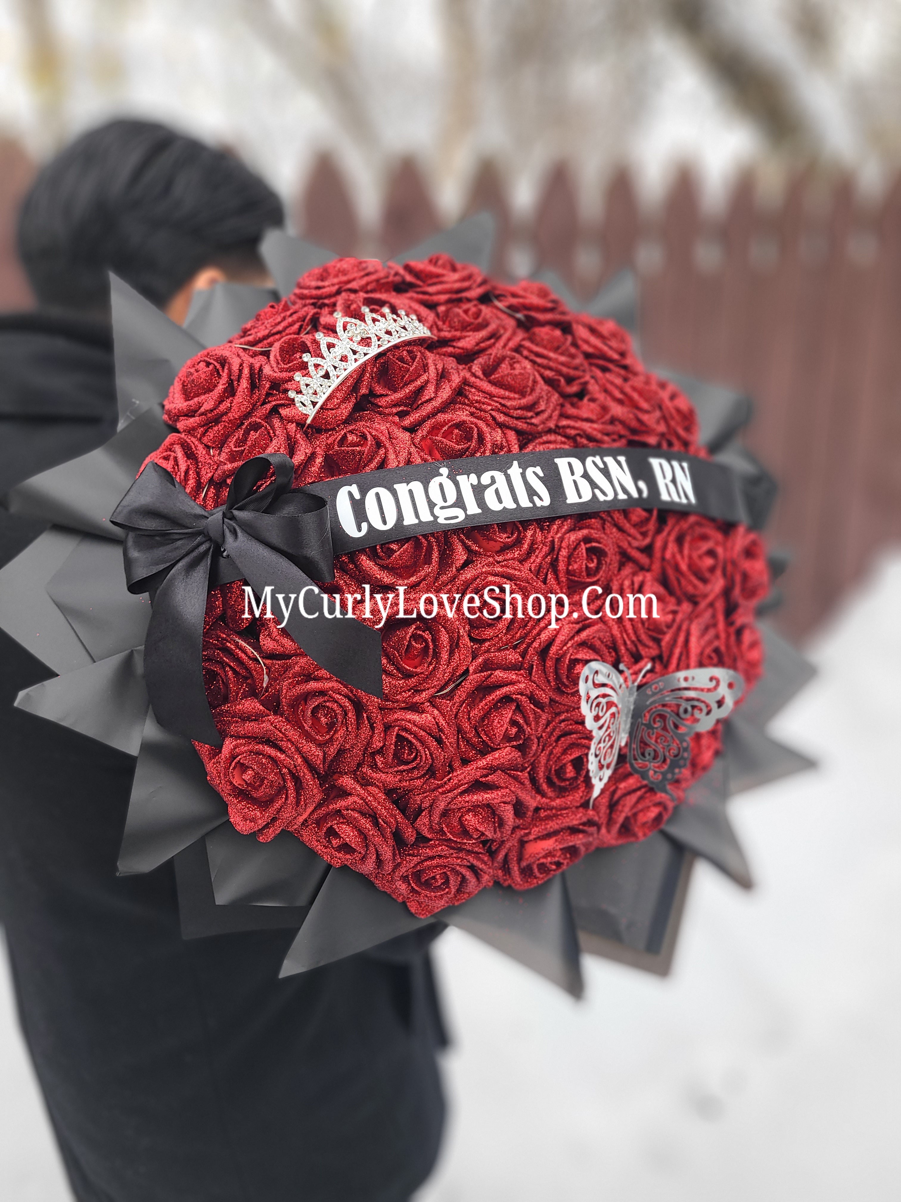 Ramo Comes with Graduation Cap or Tiara. Glitter Roses.  Banner and Lights are additional, see selection.