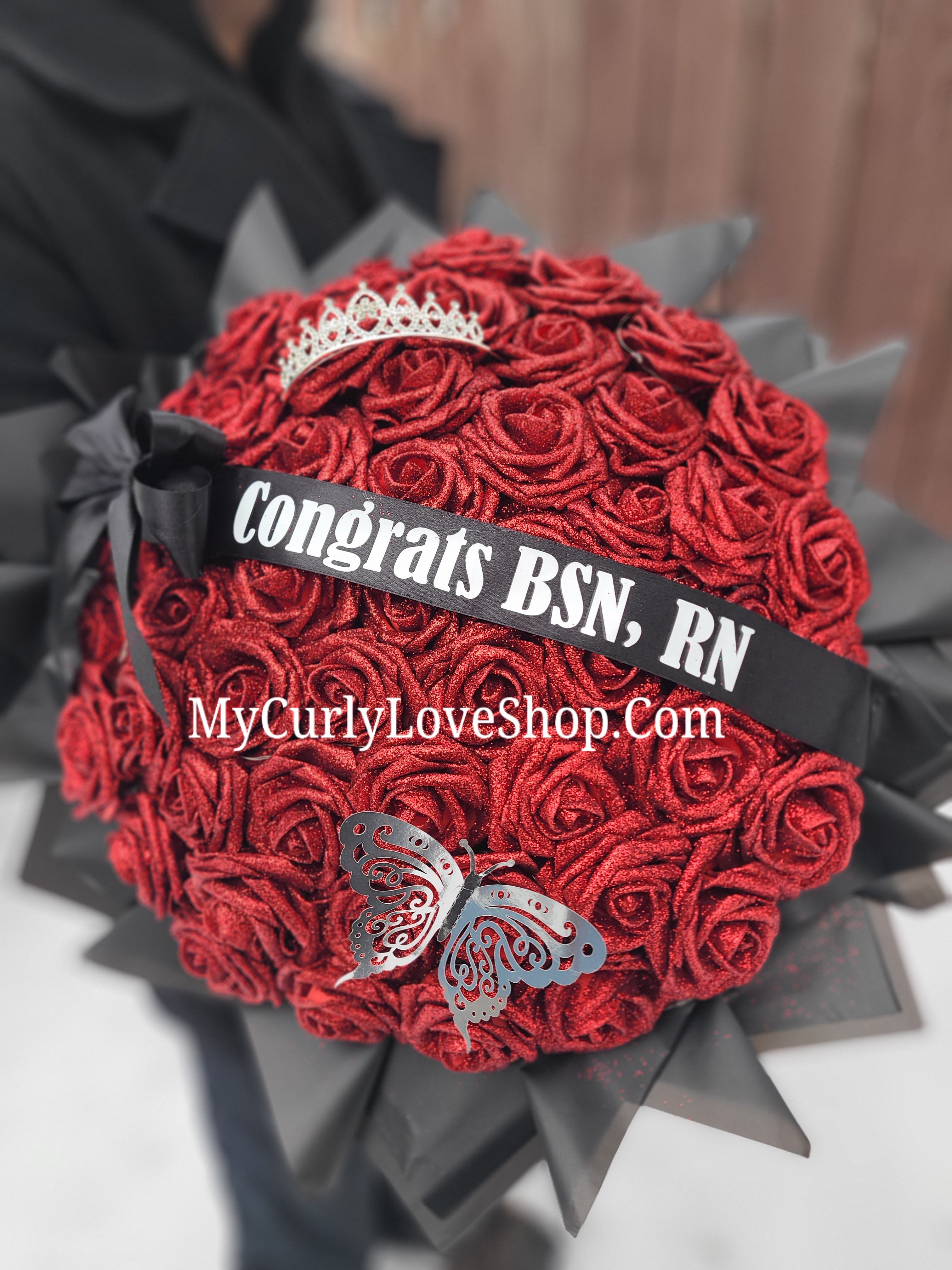 Ramo Comes with Graduation Cap or Tiara. Glitter Roses.  Banner and Lights are additional, see selection.