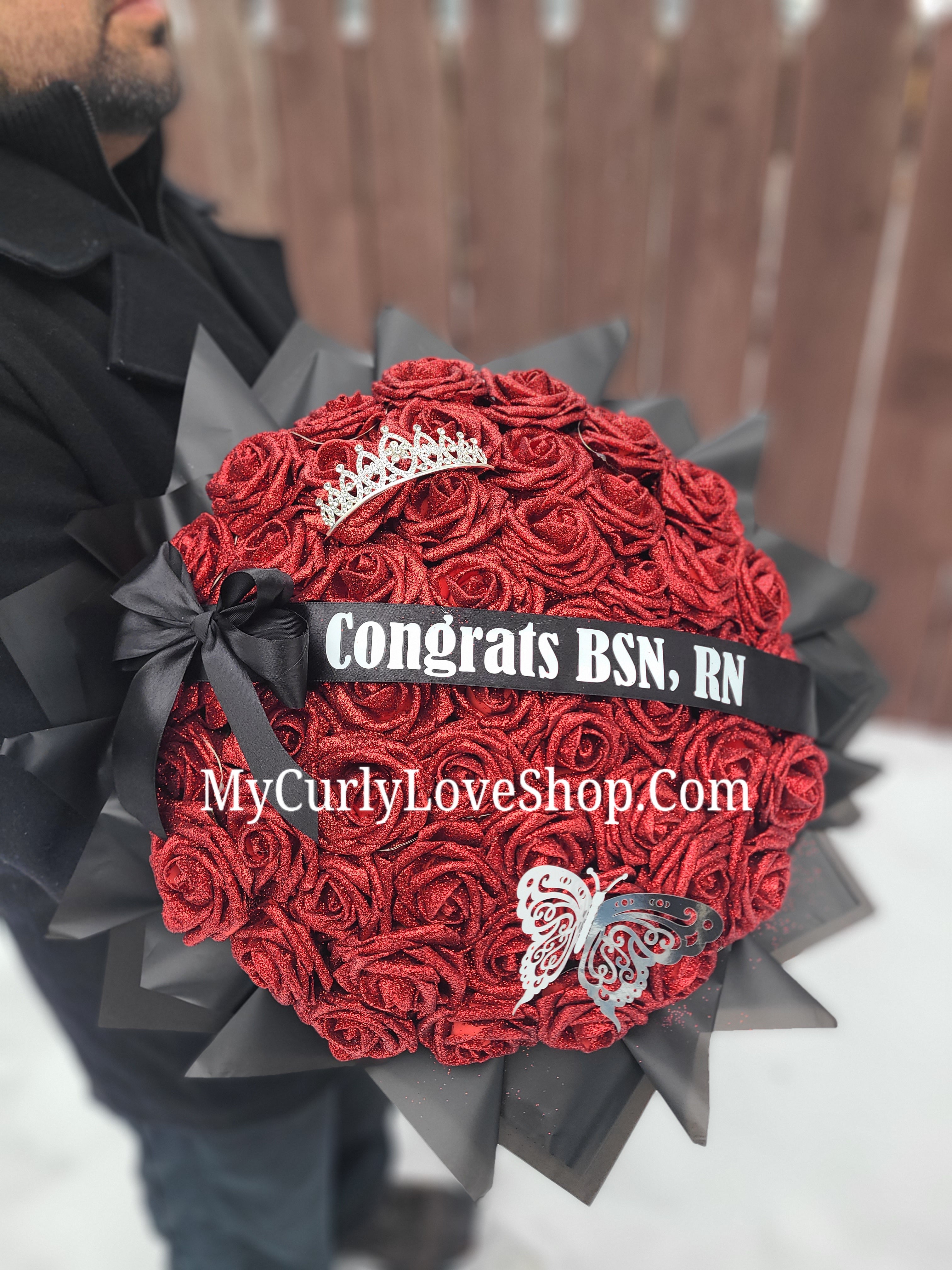 Ramo Comes with Graduation Cap or Tiara. Glitter Roses.  Banner and Lights are additional, see selection.