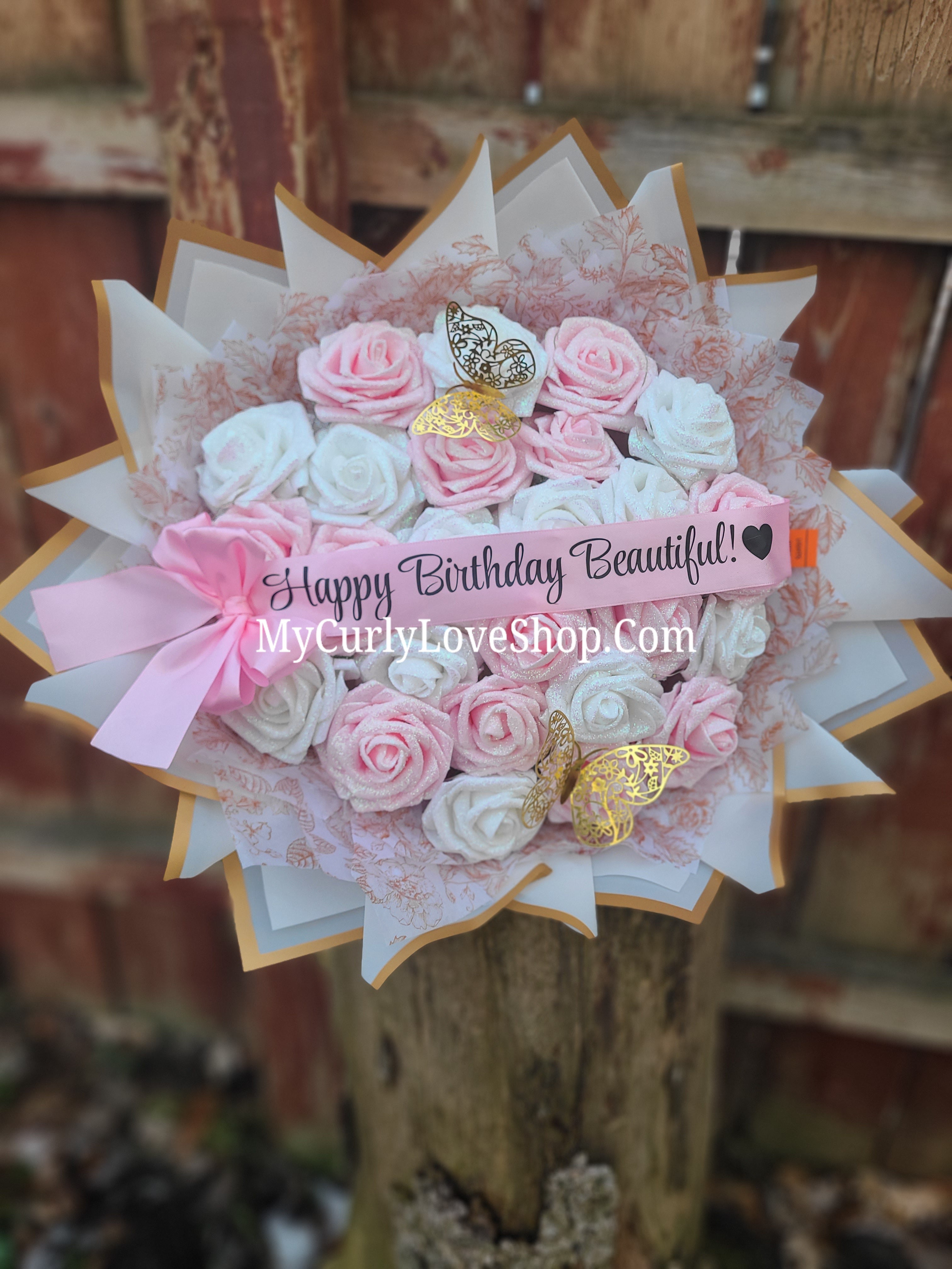 Floral Glitter Roses Bouquet. Comes with two gold butterflies. Banner and Lights are additional. See selection.