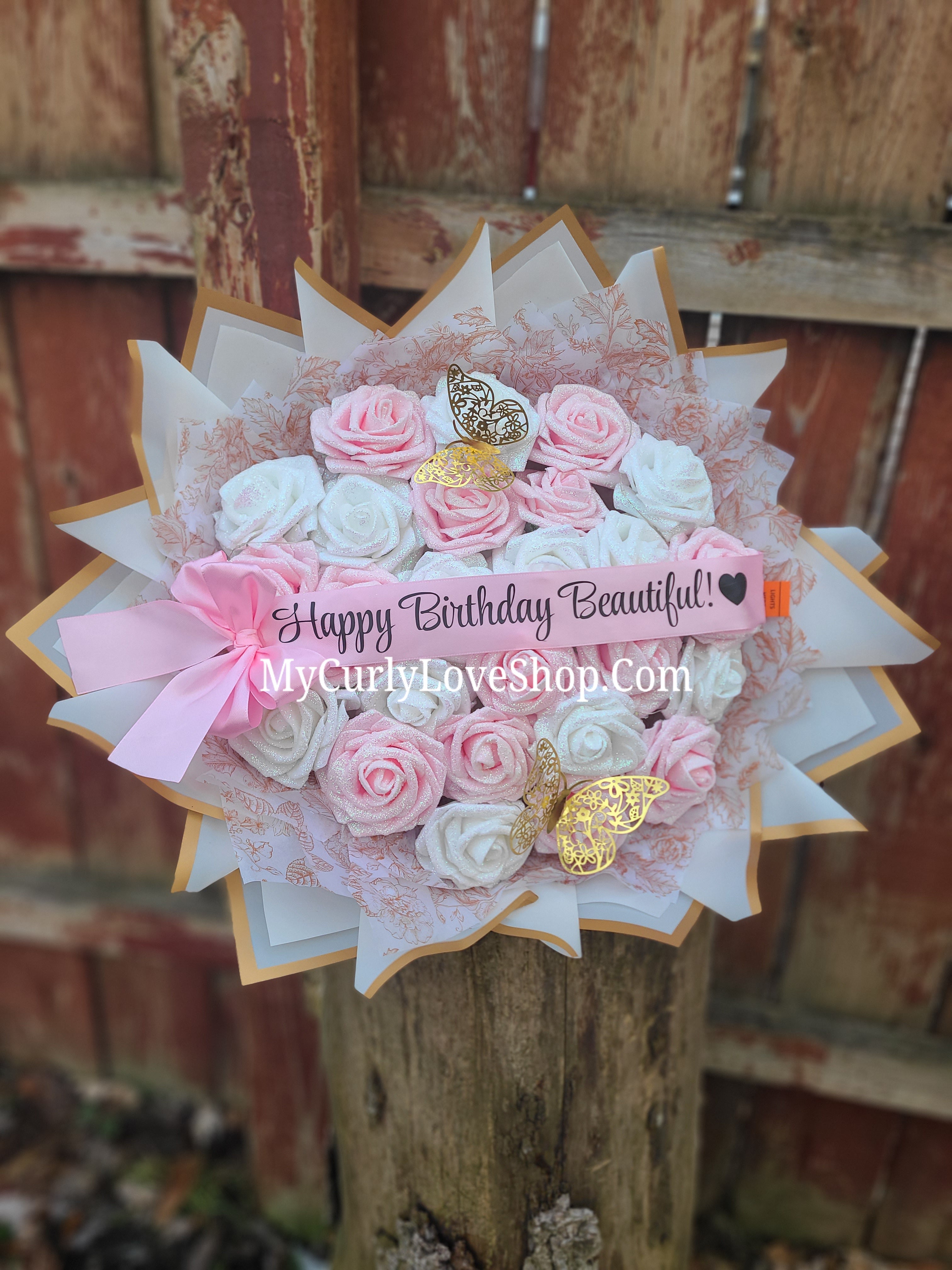 Floral Glitter Roses Bouquet. Comes with two gold butterflies. Banner and Lights are additional. See selection.