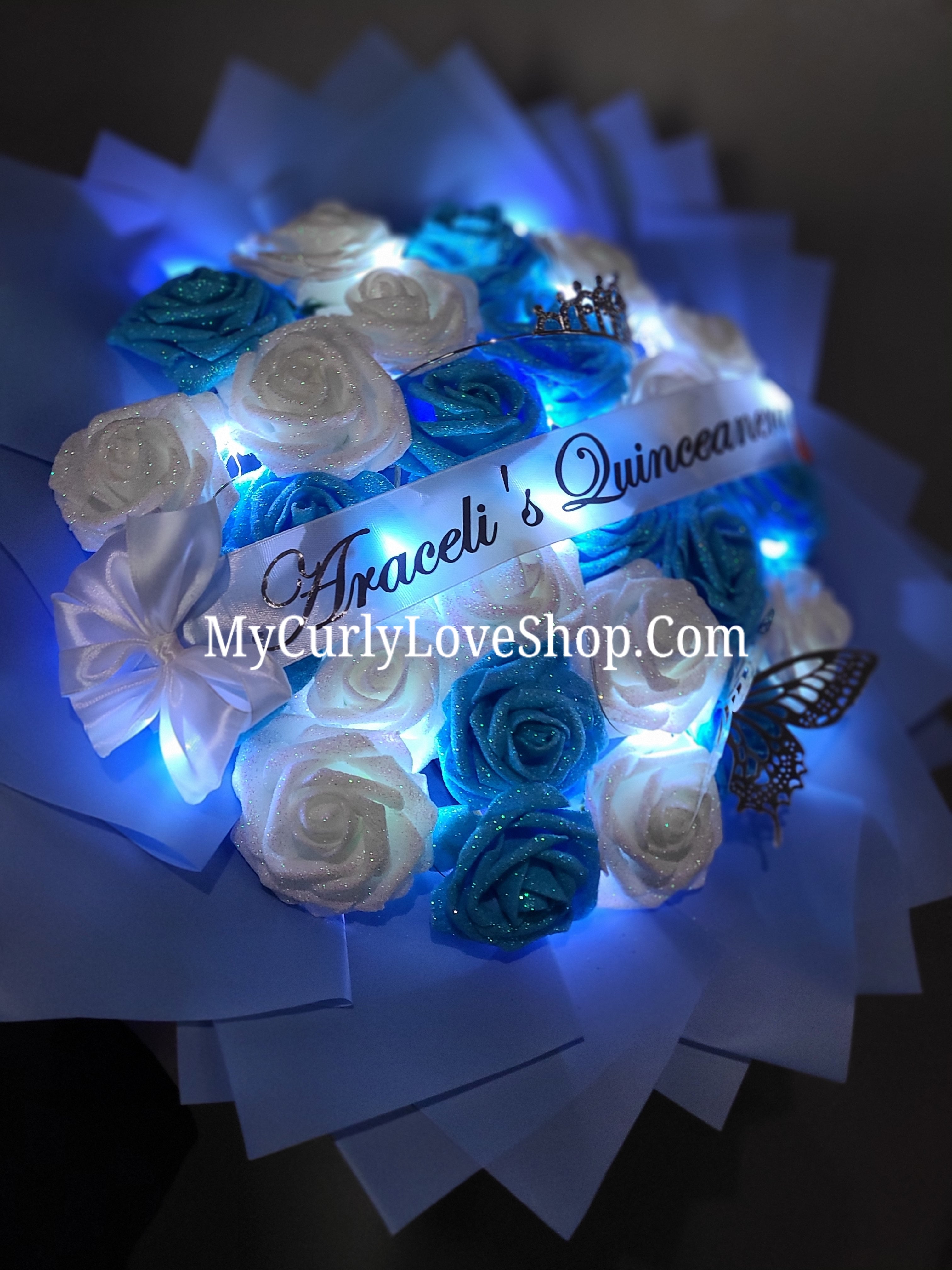 BLUE Glitter Roses Bouquet: Tiara and Butterfly Included (Tiara and Butterfly Shape Can Vary Depending on Availability) Banner and Lights are additional.