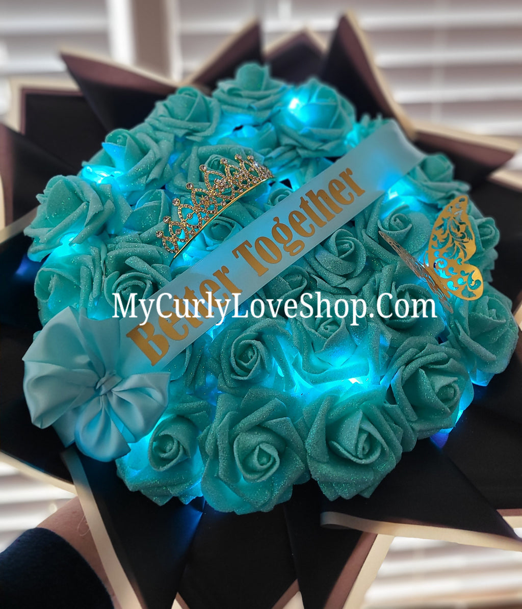 Glitter Roses Bouquet: Tiara and Butterfly Included (Tiara and Butterfly Shape Can Vary Depending on Availability) Banner and Lights are additional.