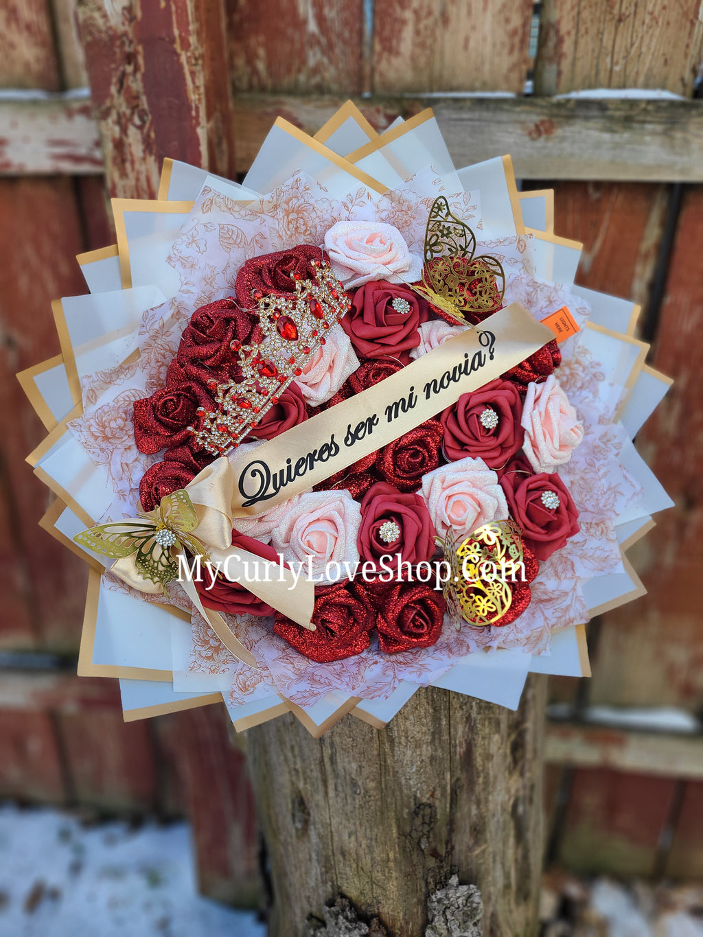 25 Roses as shown, Tiara and Banner Included. Lights are additional.