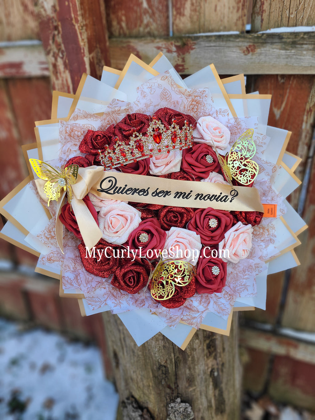 25 Roses as shown, Tiara and Banner Included. Lights are additional.
