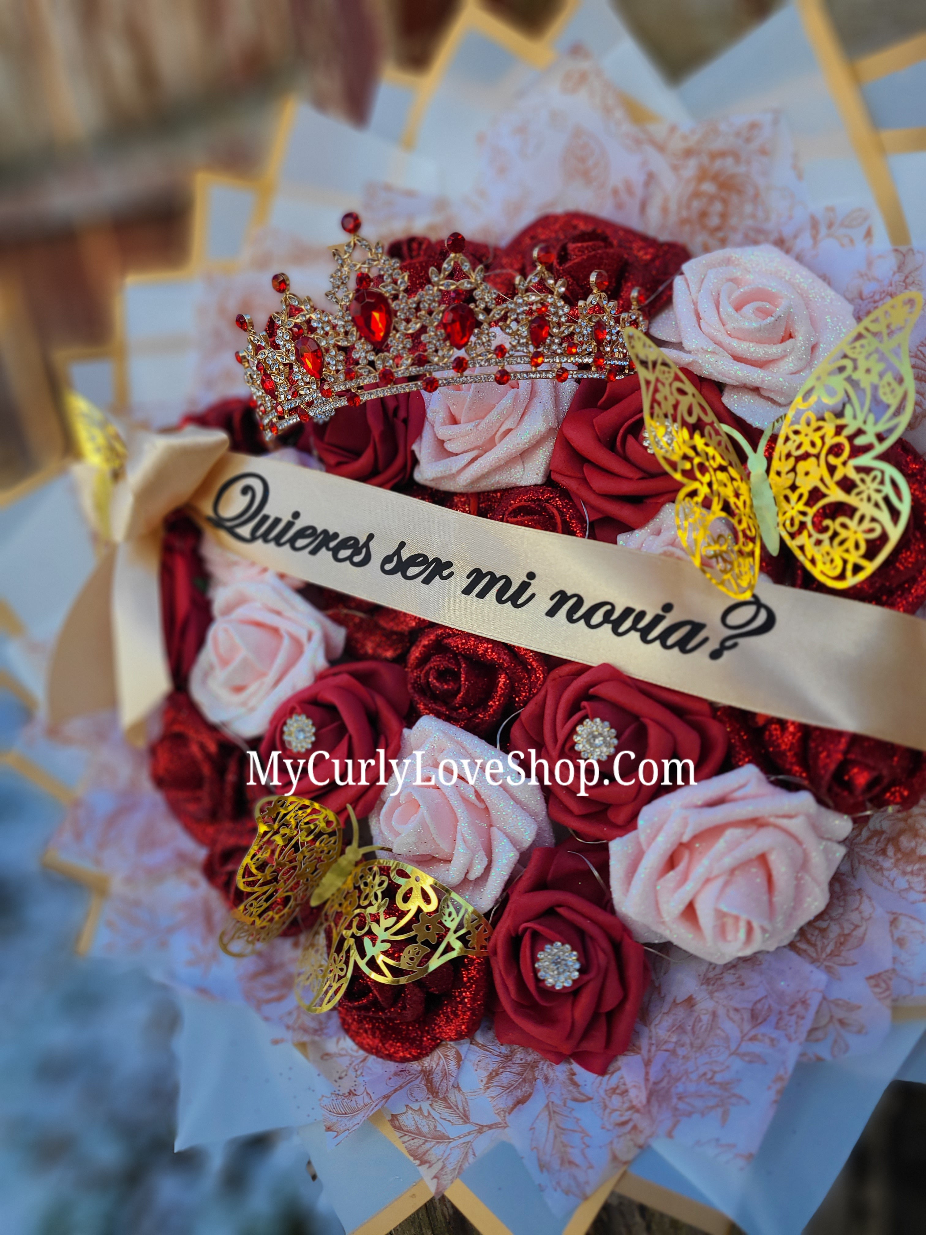 25 Roses as shown, Tiara and Banner Included. Lights are additional.