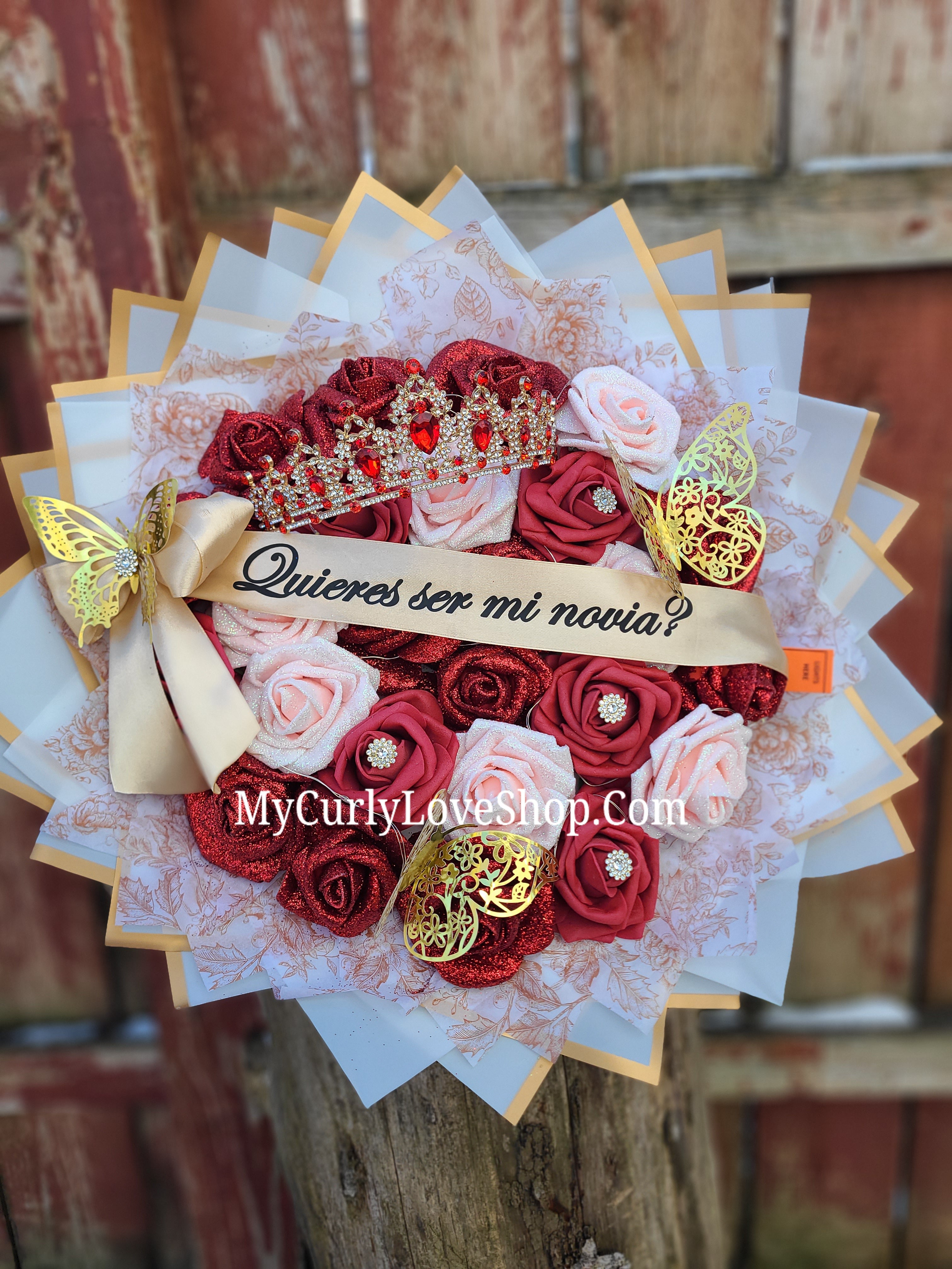 25 Roses as shown, Tiara and Banner Included. Lights are additional.