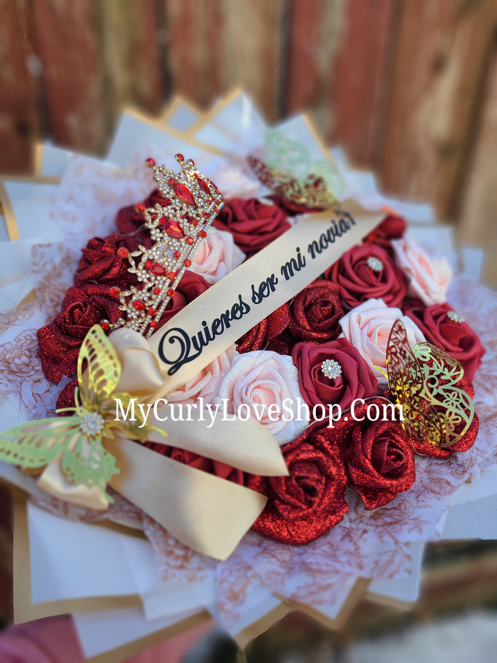 25 Roses as shown, Tiara and Banner Included. Lights are additional.