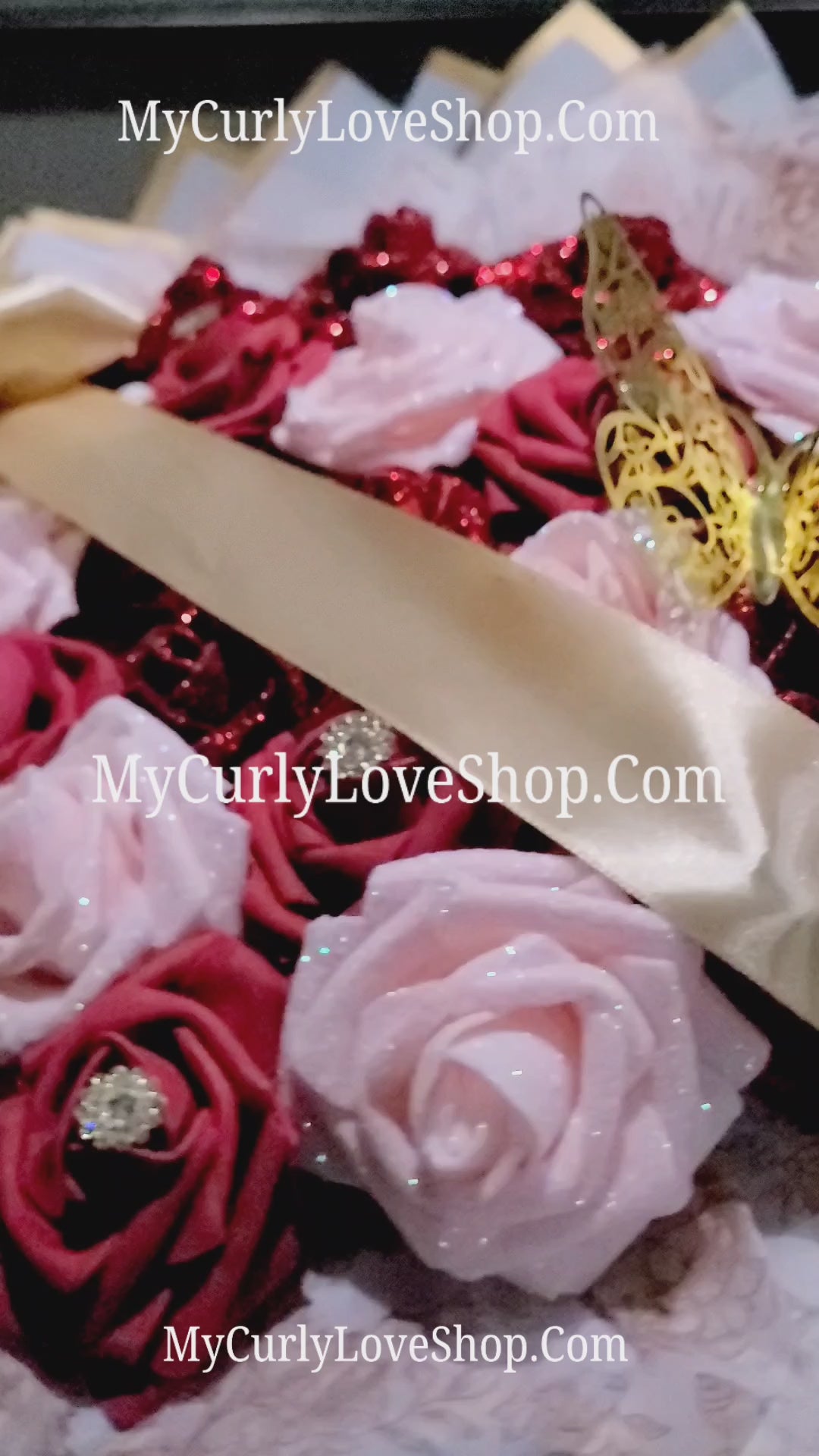 25 Roses as shown, Tiara and Banner Included. Lights are additional.