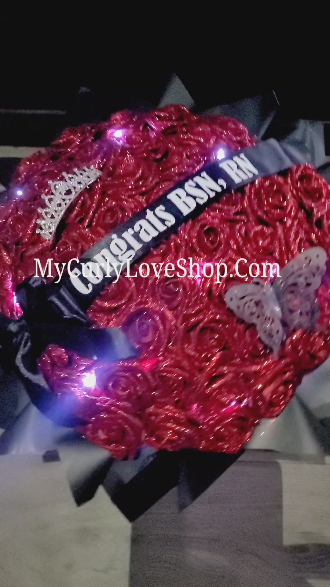 Ramo Comes with Graduation Cap or Tiara. Glitter Roses.  Banner and Lights are additional, see selection.
