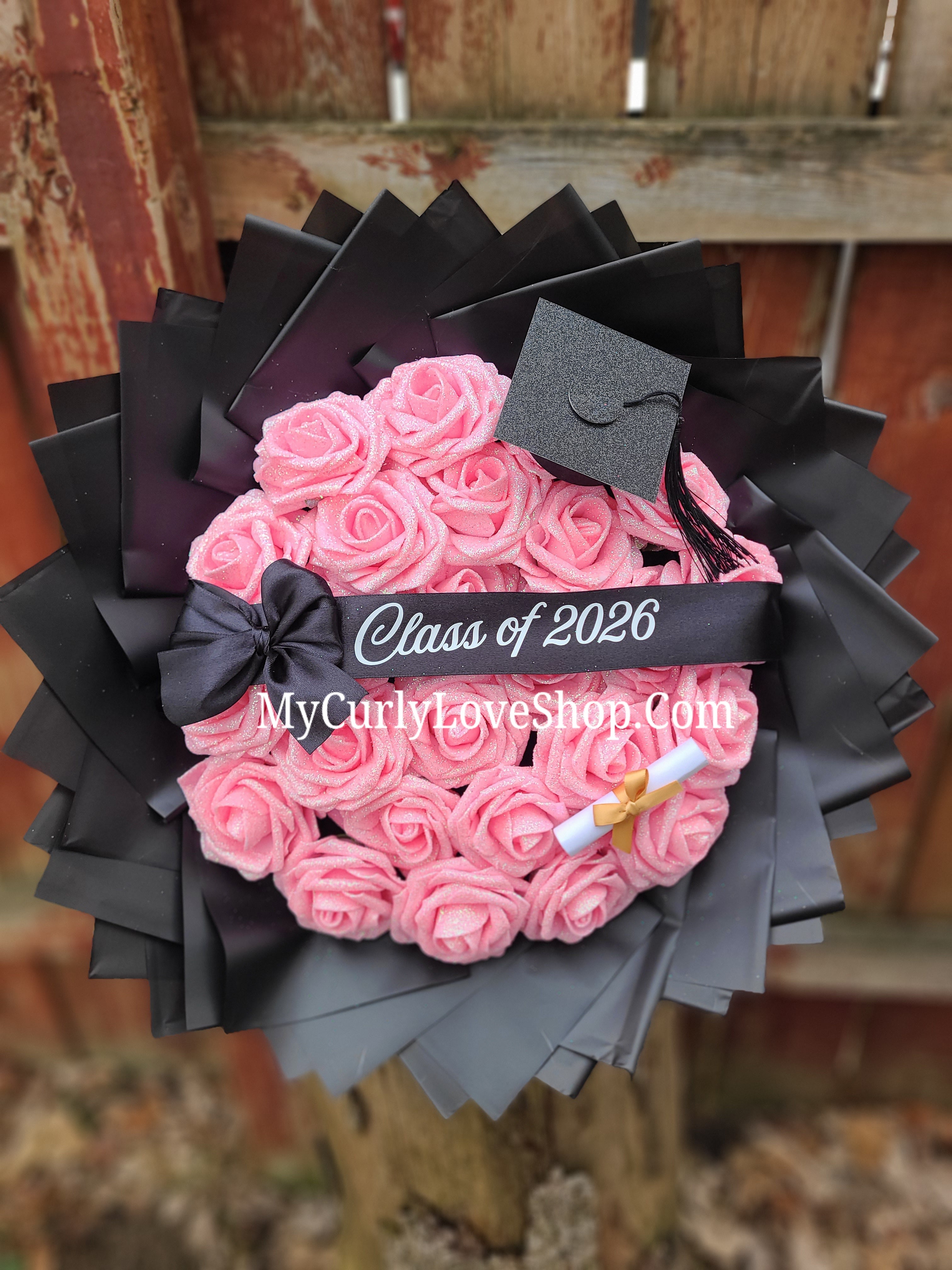 Graduation Glitter Roses Bouquet. Graduation Cap and Diploma Embellishment Included. Banner and Lights are additional.