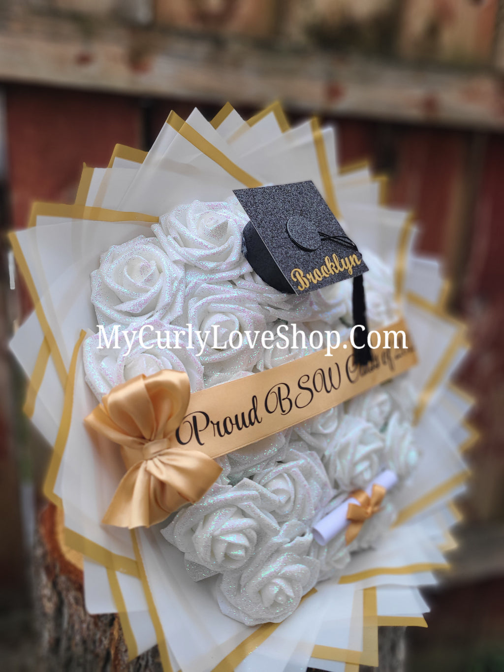 Graduation Glitter Roses Bouquet. Graduation Cap and Diploma Embellishment Included. Name on the Cap, Banner and Lights are additional.