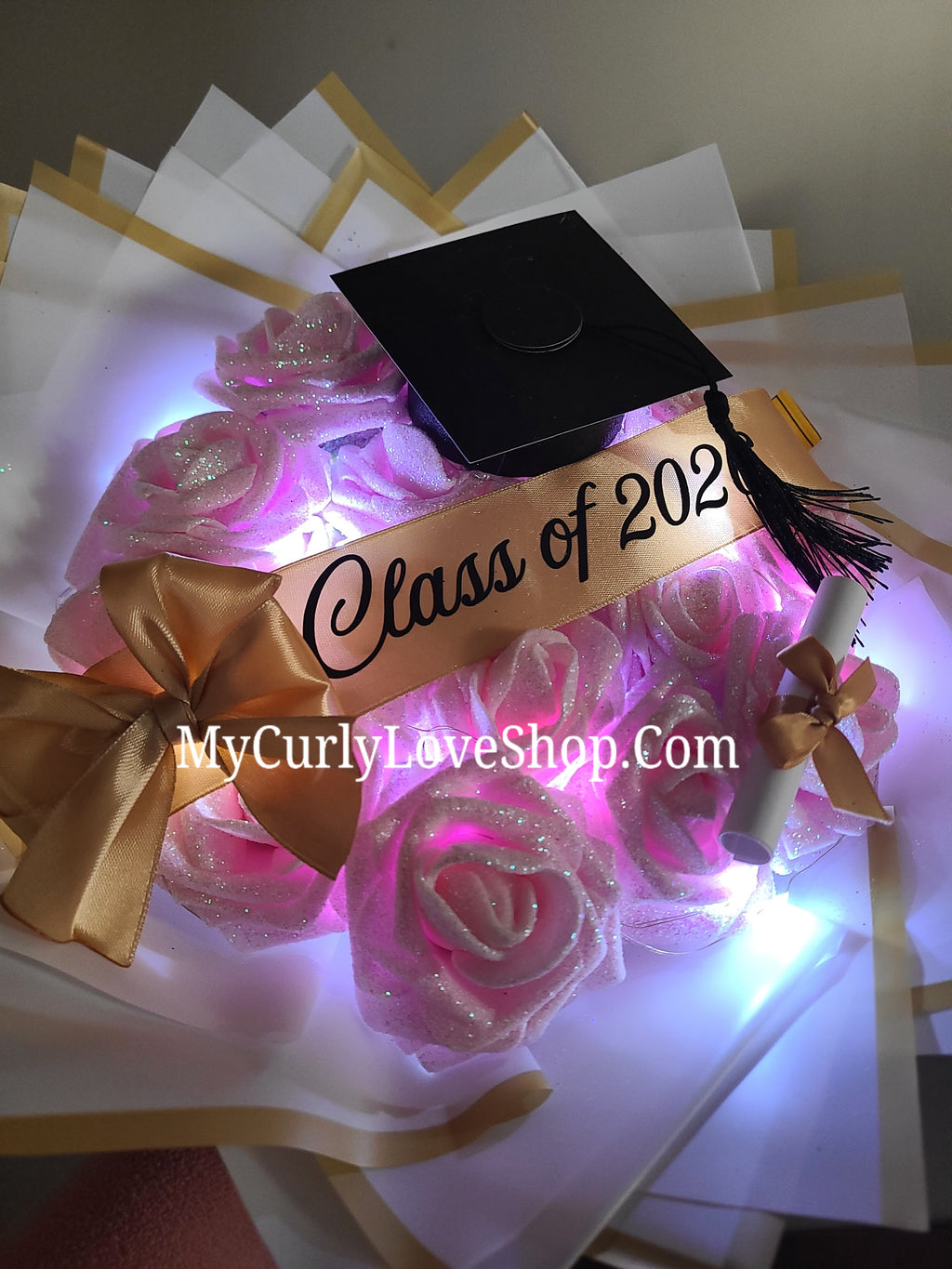 Graduation Glitter Roses Bouquet. Graduation Cap and Diploma Embellishment Included. Name on the Cap, Banner and Lights are additional.