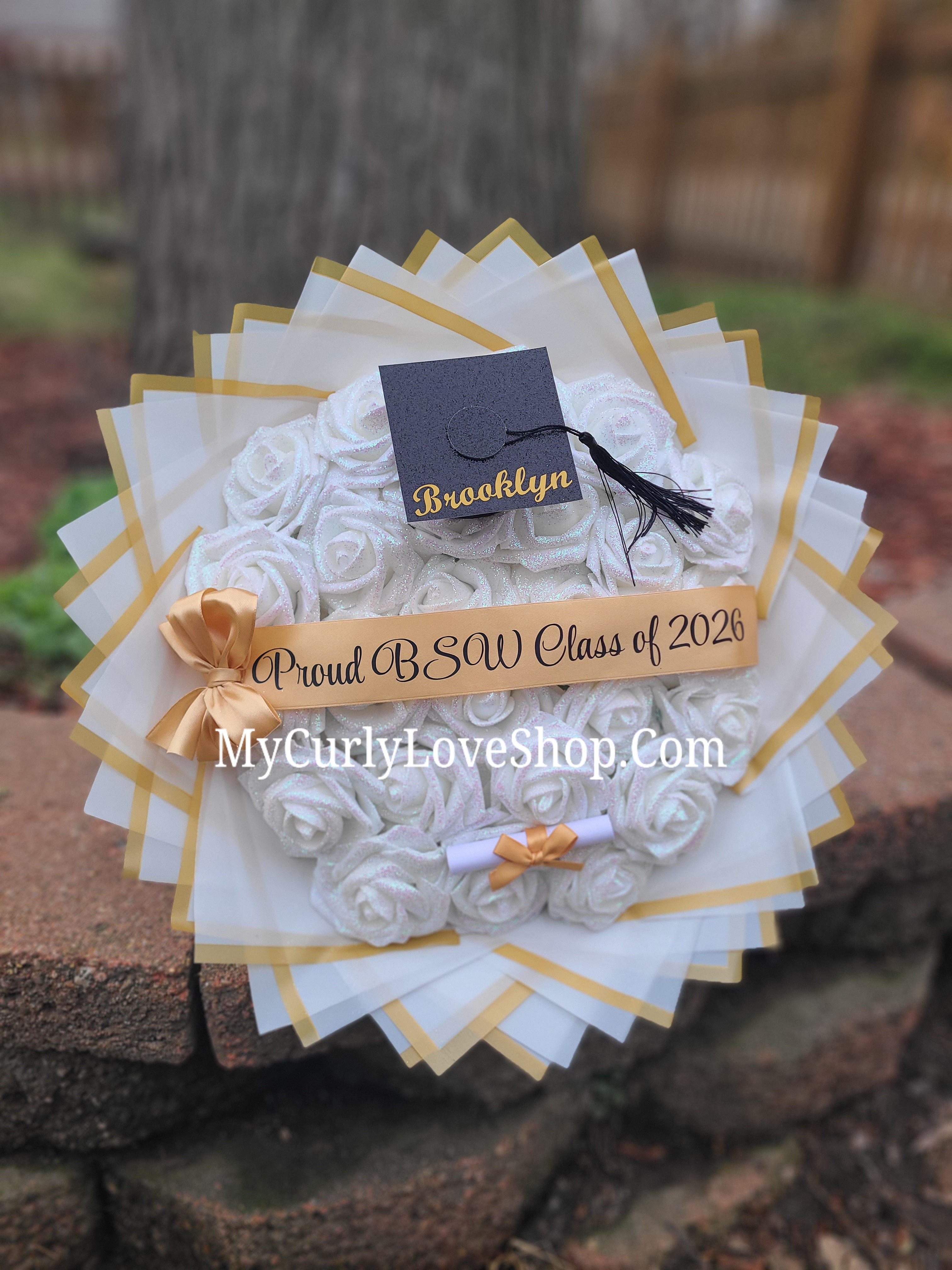 Graduation Glitter Roses Bouquet. Graduation Cap and Diploma Embellishment Included. Name on the Cap, Banner and Lights are additional.