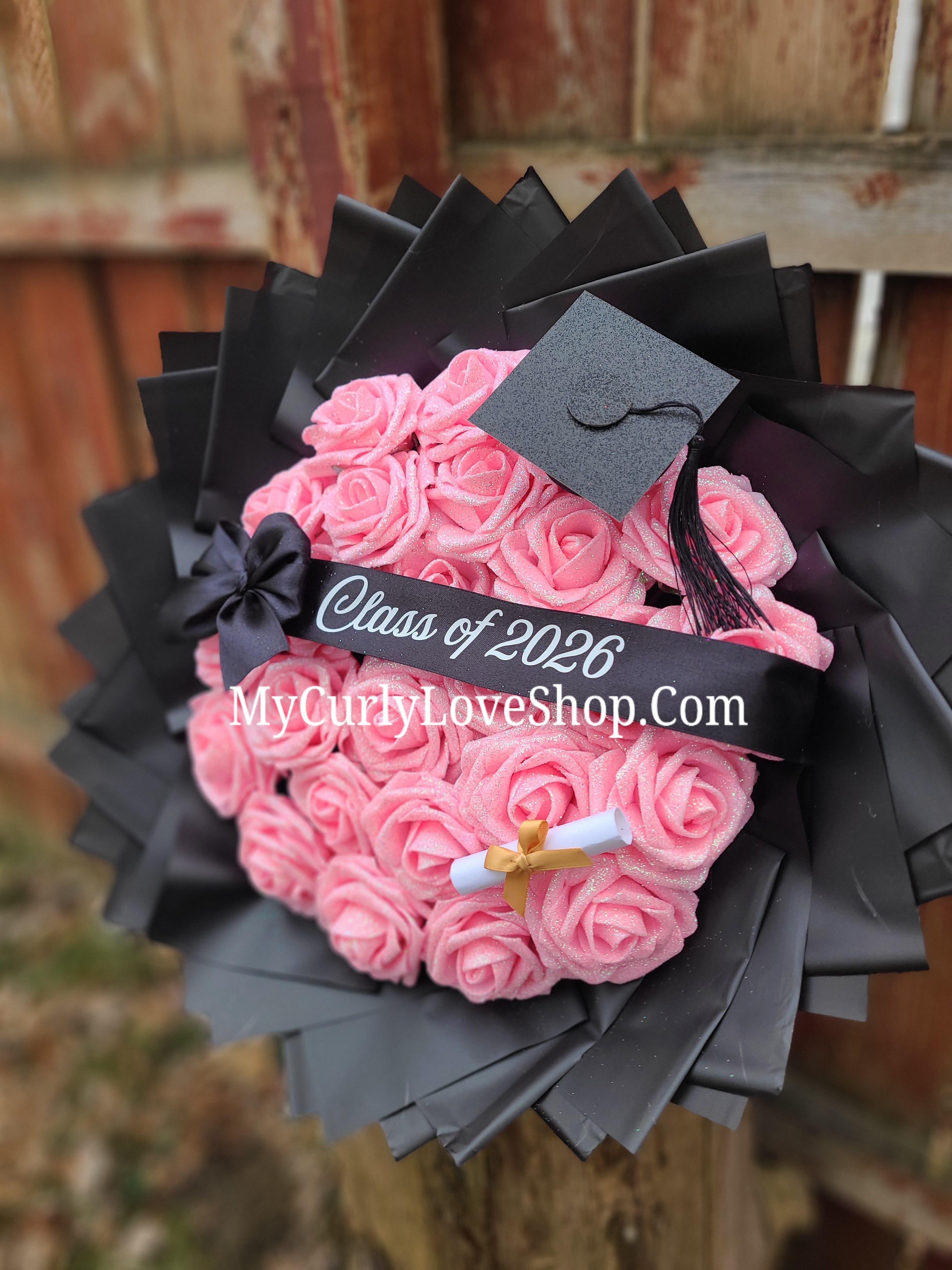 Graduation Glitter Roses Bouquet. Graduation Cap and Diploma Embellishment Included. Banner and Lights are additional.