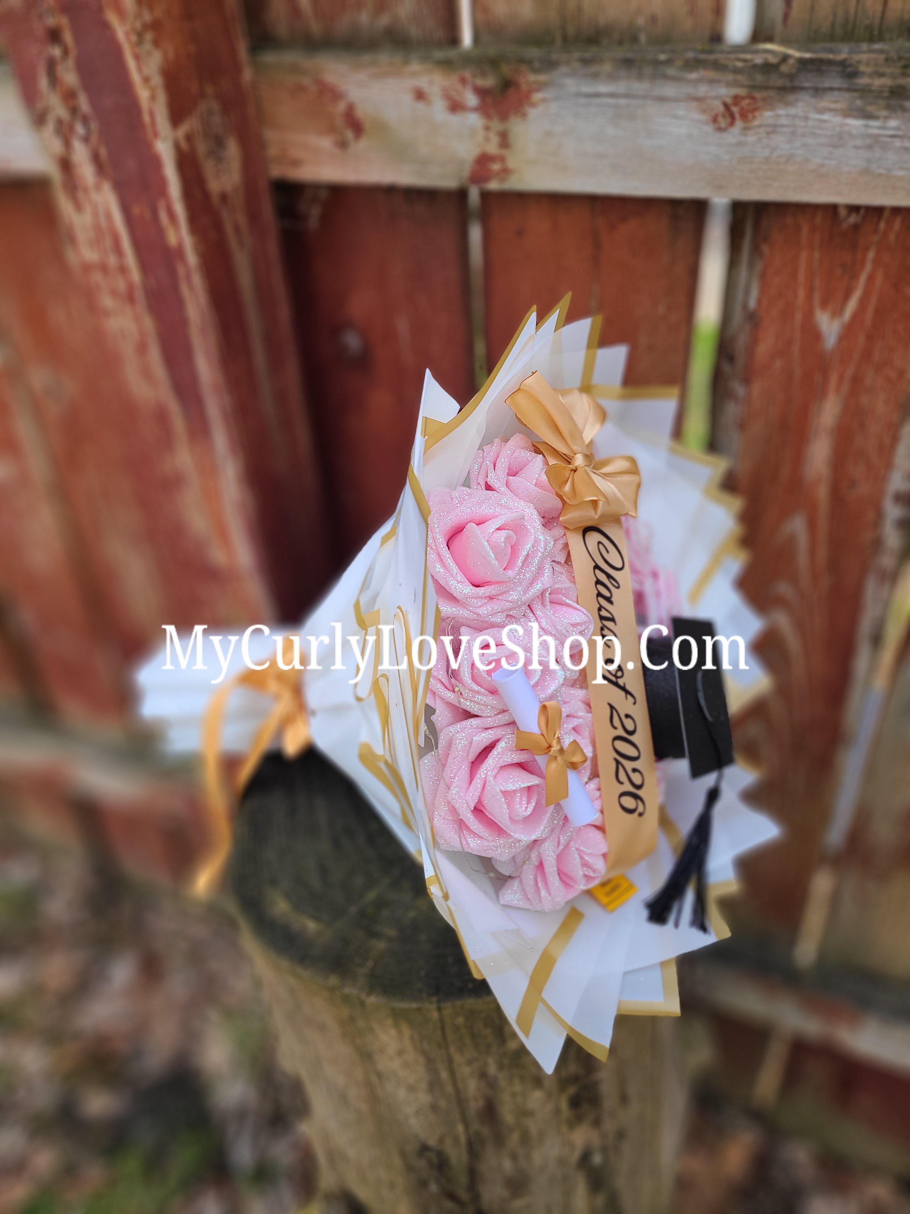 Graduation Glitter Roses Bouquet. Graduation Cap and Diploma Embellishment Included. Name on the Cap, Banner and Lights are additional.