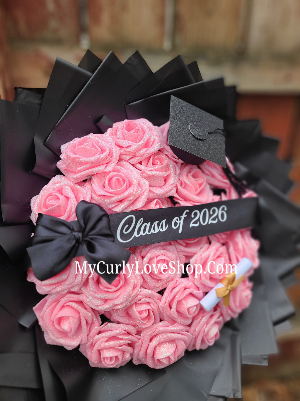 Graduation Glitter Roses Bouquet. Graduation Cap and Diploma Embellishment Included. Banner and Lights are additional.