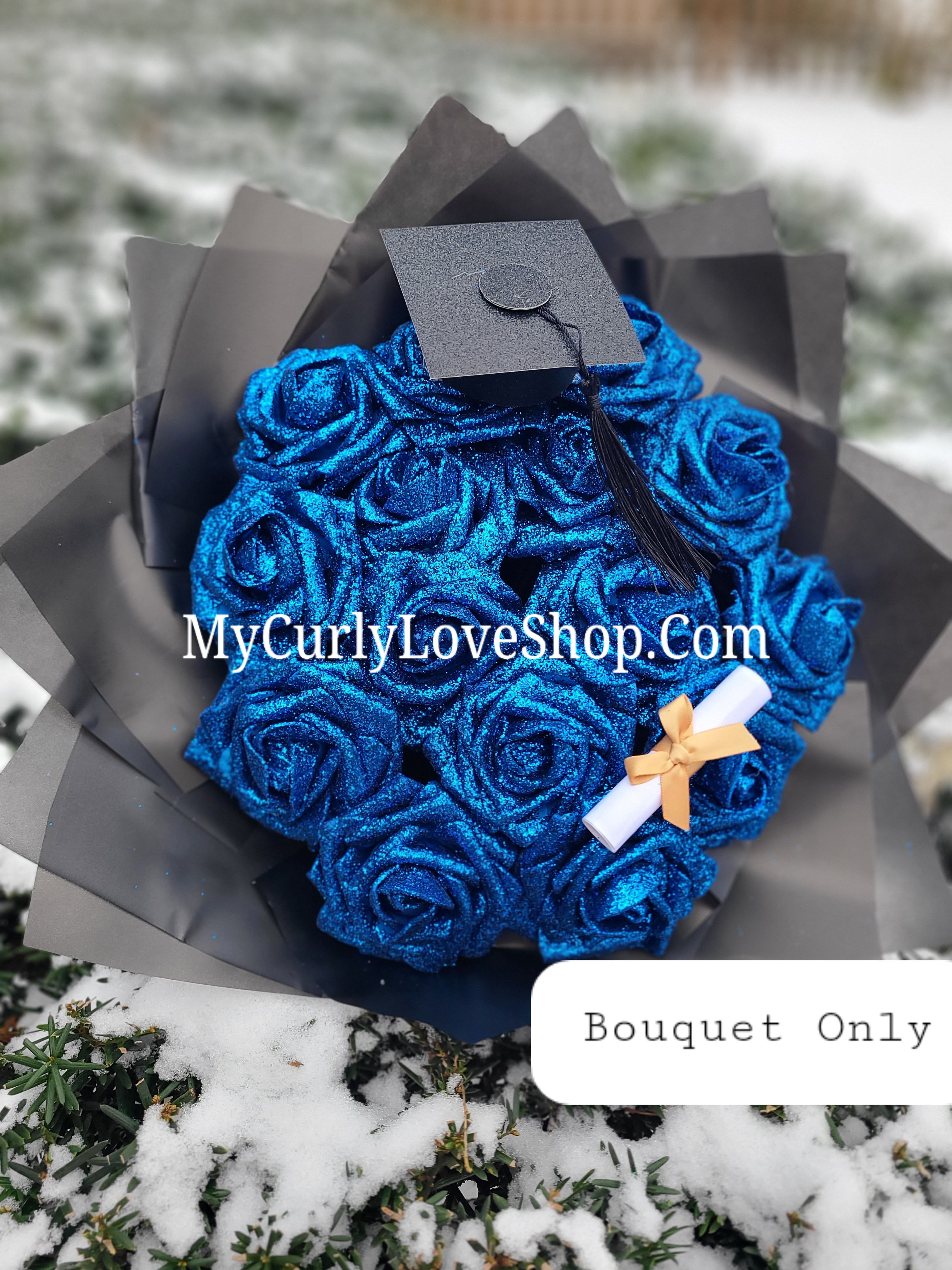 Graduation Glitter Roses Bouquet. Graduation Cap and Diploma Embellishment Included. Banner and Lights are additional.