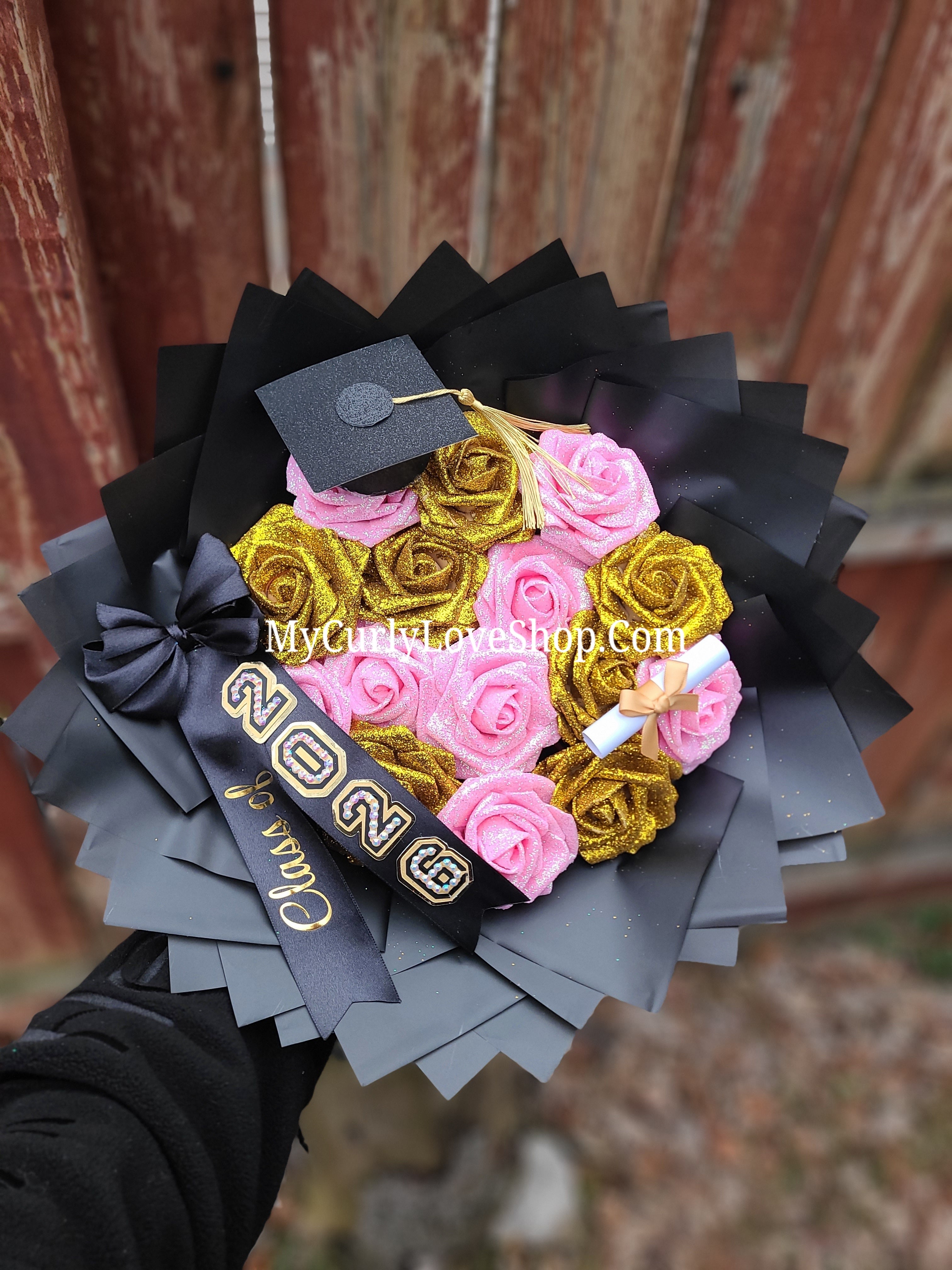 Graduation Bouquet comes with Personalized Graduation Cap, Diploma Embellishment, and Class of 2026 Ribbon. Lights are additional, see selection.&nbsp;